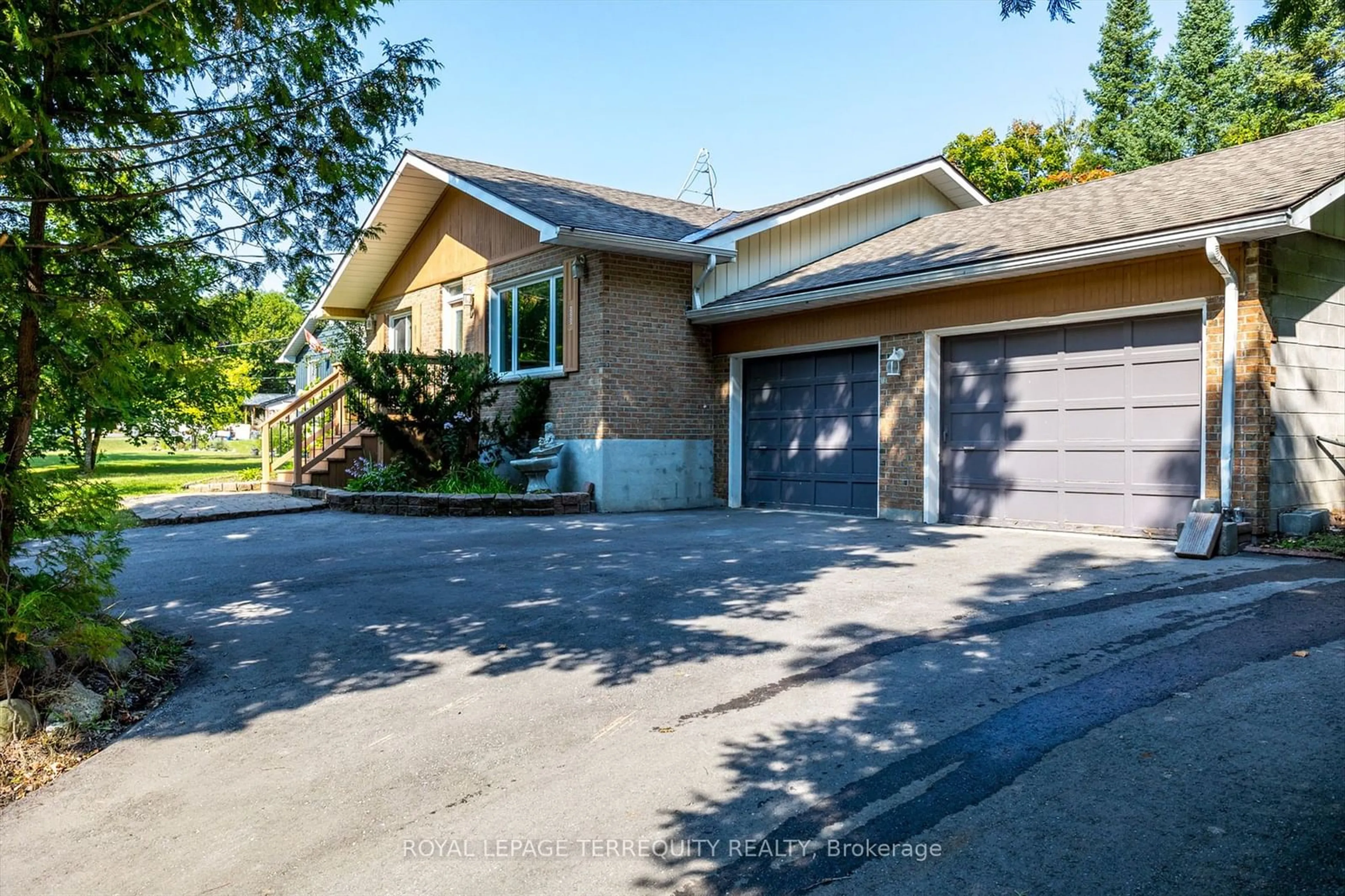 Frontside or backside of a home, the street view for 12 Cliffside Dr, Kawartha Lakes Ontario K0L 1T0