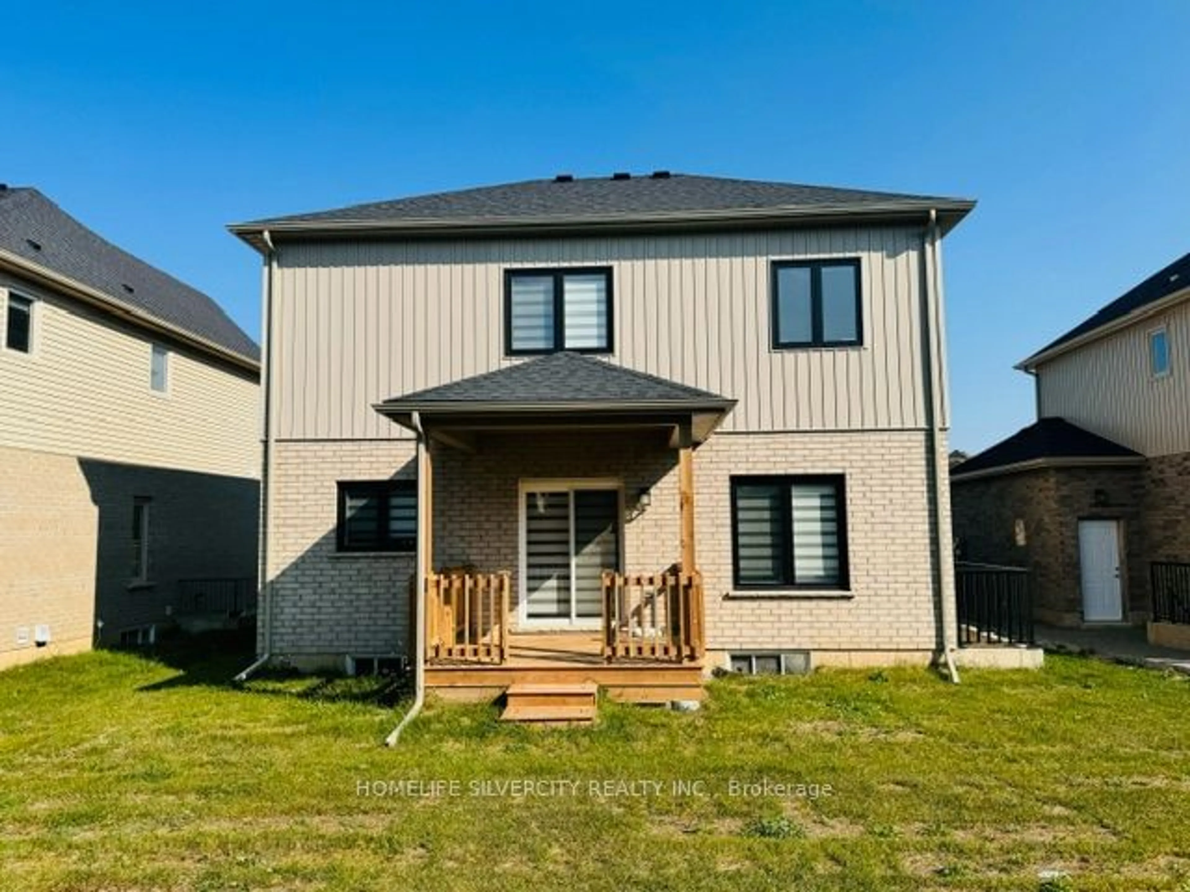 Frontside or backside of a home, the fenced backyard for 27 Autumn Ave, Thorold Ontario L2V 0H2