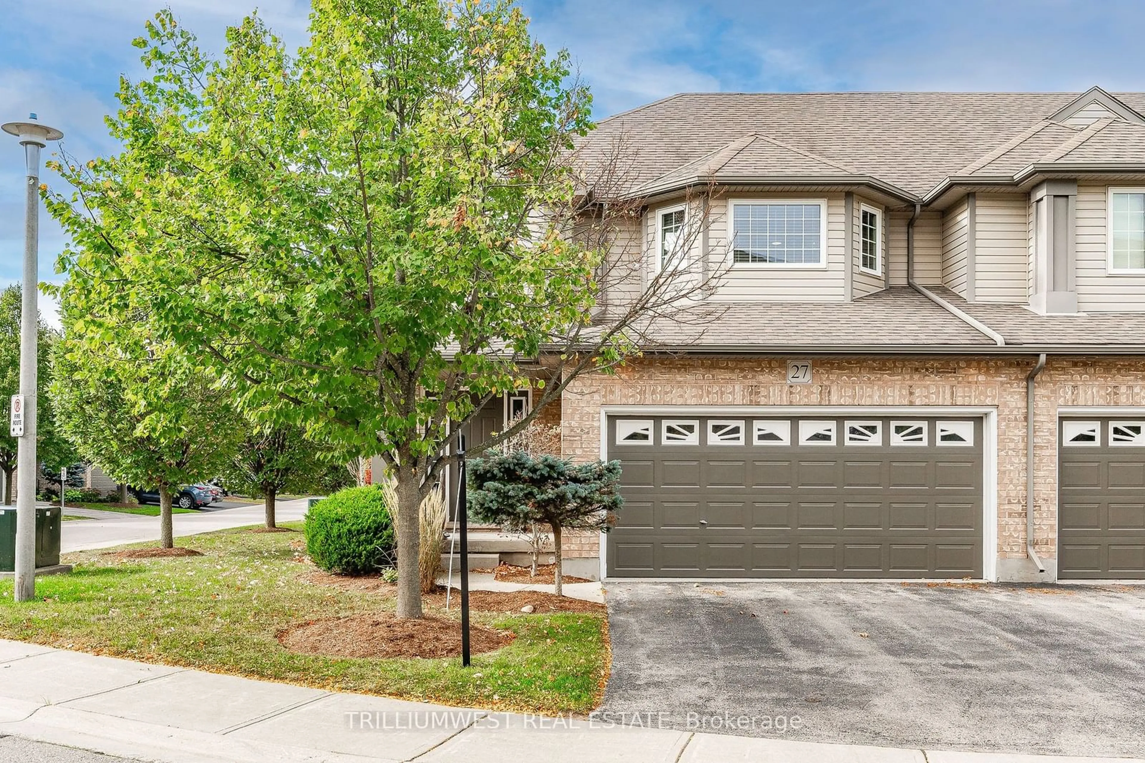 A pic from exterior of the house or condo, the street view for 255 Summerfield Dr #27, Guelph Ontario N1L 0E1