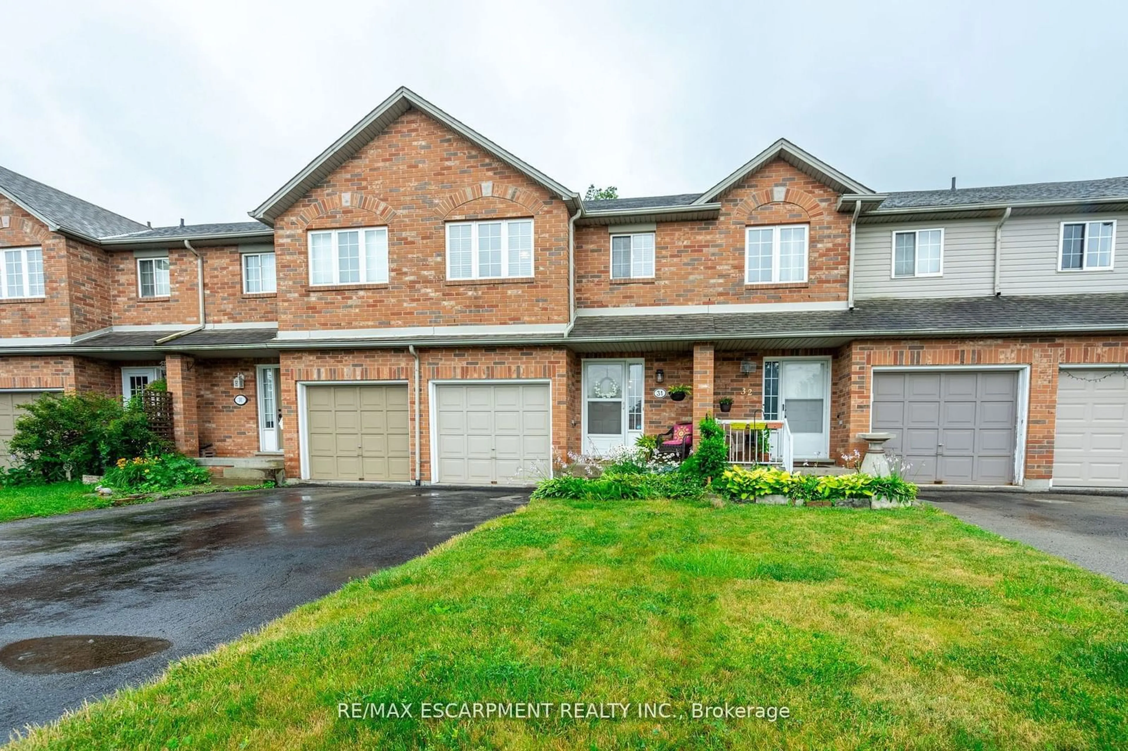 A pic from exterior of the house or condo, the street view for 10 Cadham Blvd #31, Hamilton Ontario L8W 3X6