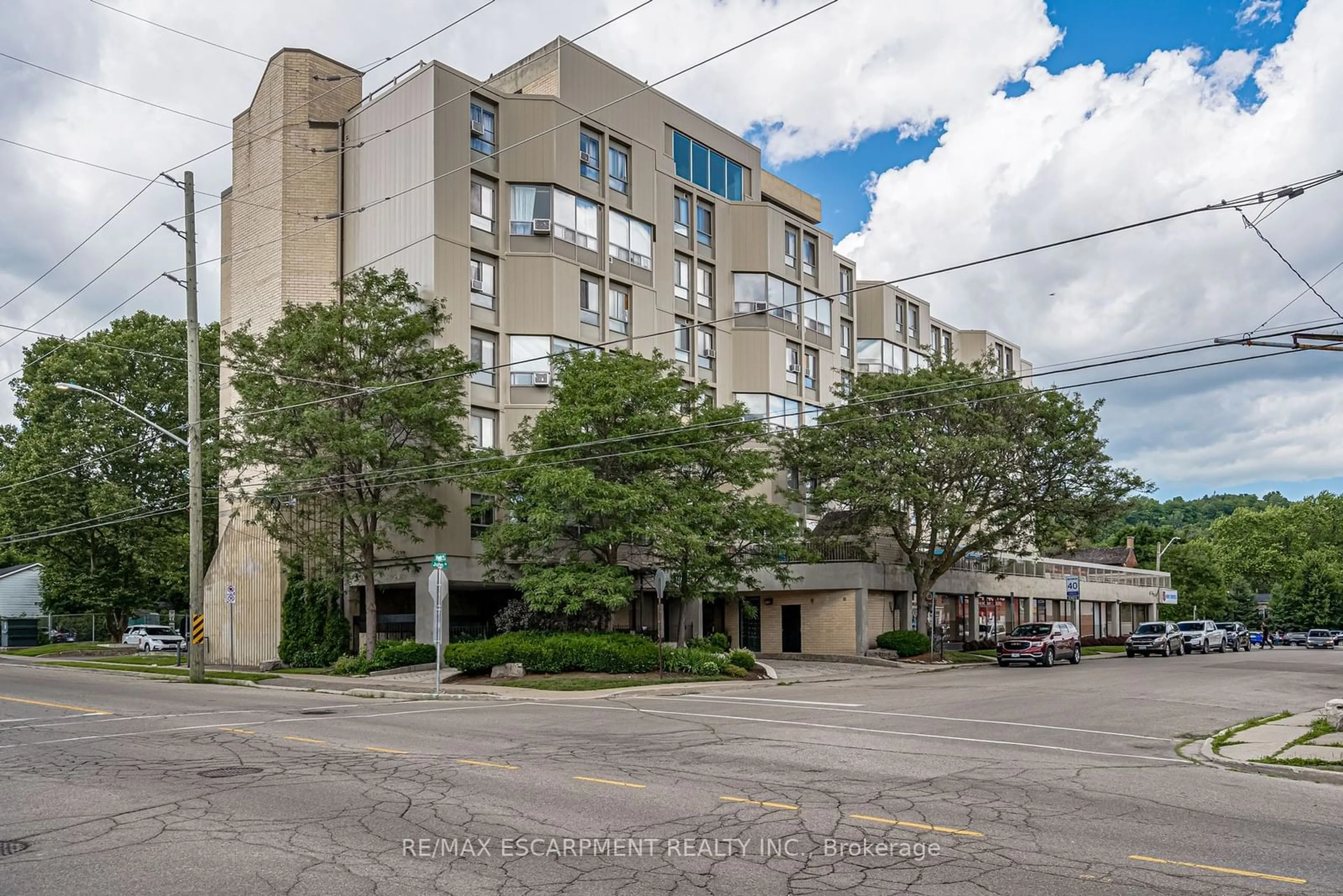 A pic from exterior of the house or condo, the front or back of building for 10 John St #209, Hamilton Ontario L9H 6J3