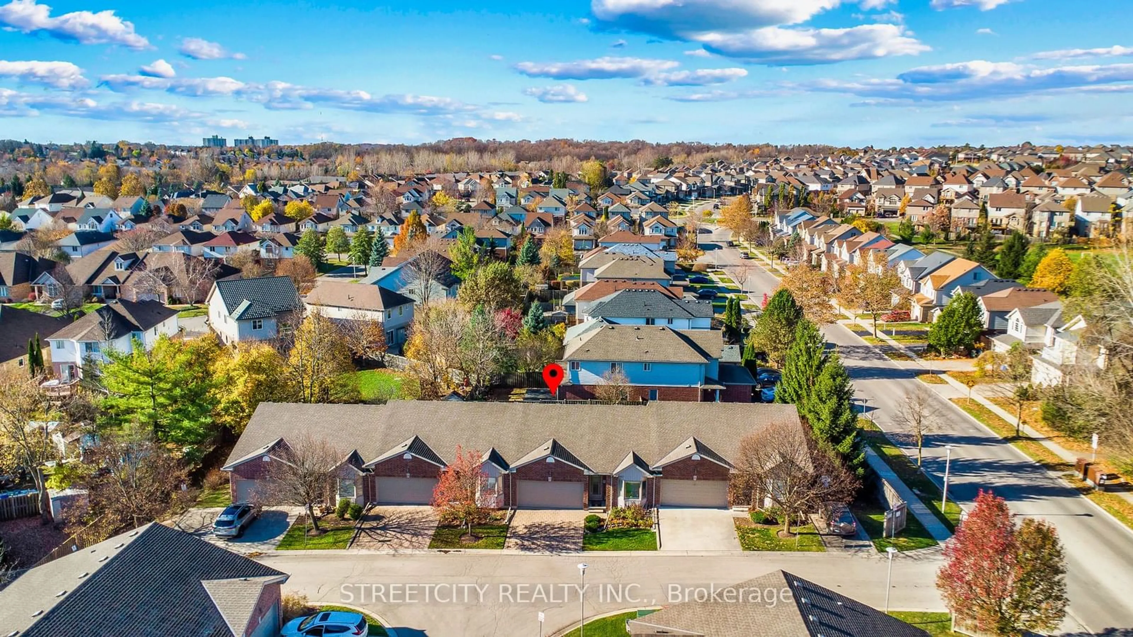 A pic from exterior of the house or condo, the fenced backyard for 95 Capulet Lane #15, London Ontario N6H 5V6