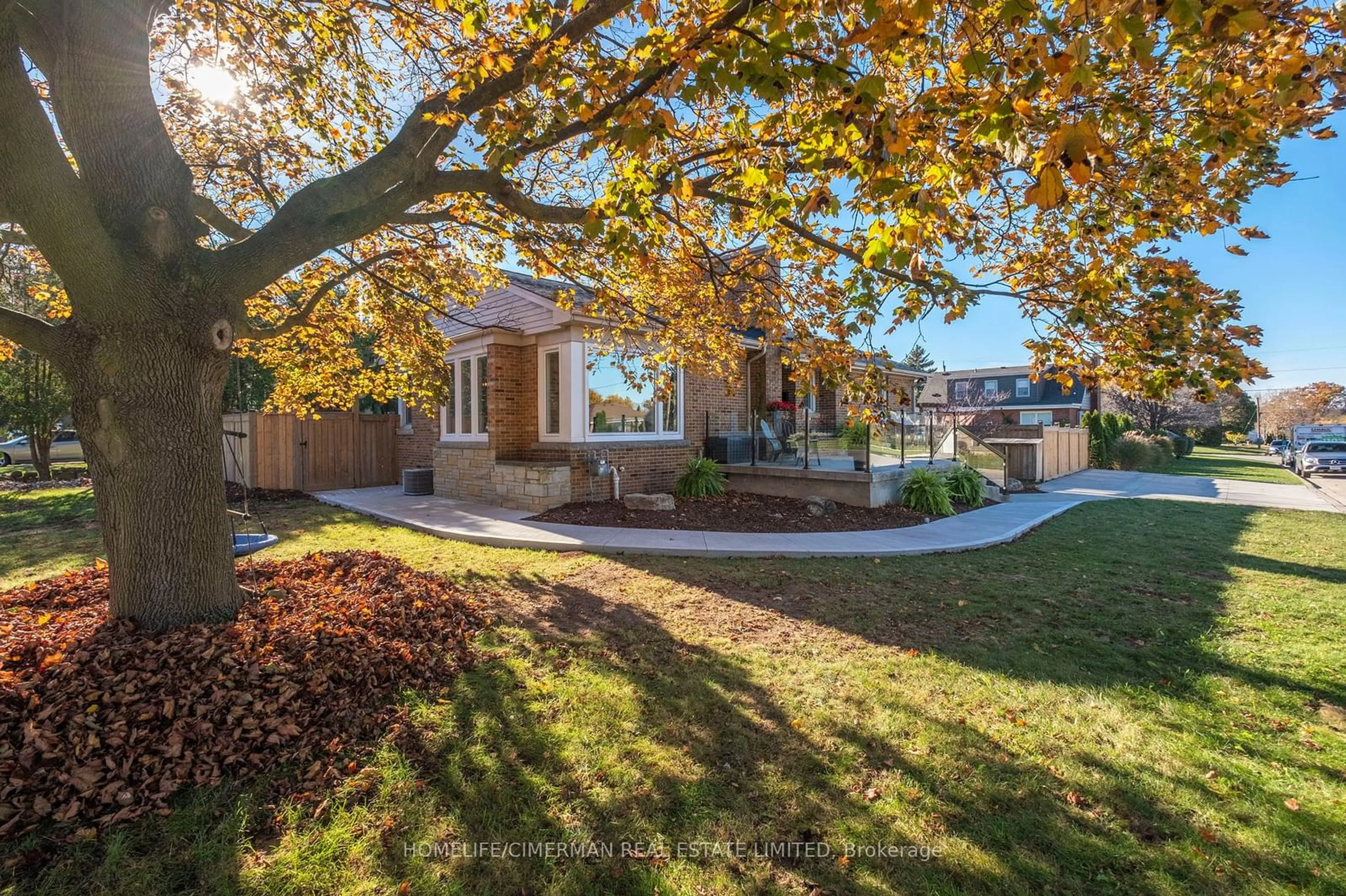 Frontside or backside of a home, the fenced backyard for 3 Robb Ave, Hamilton Ontario L8G 1N5