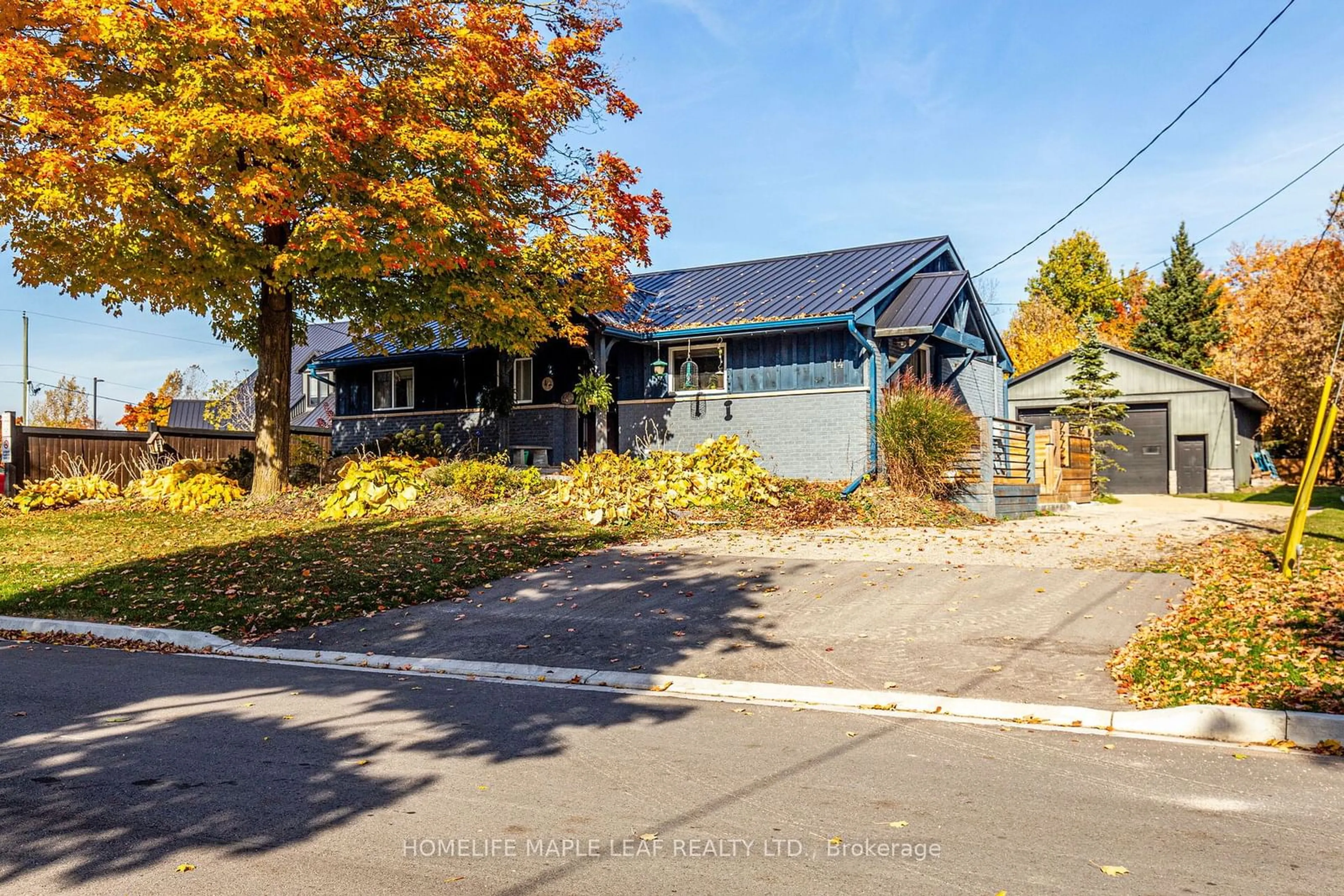 Frontside or backside of a home, the street view for 14 WEBB St, East Luther Grand Valley Ontario L9W 5Y4