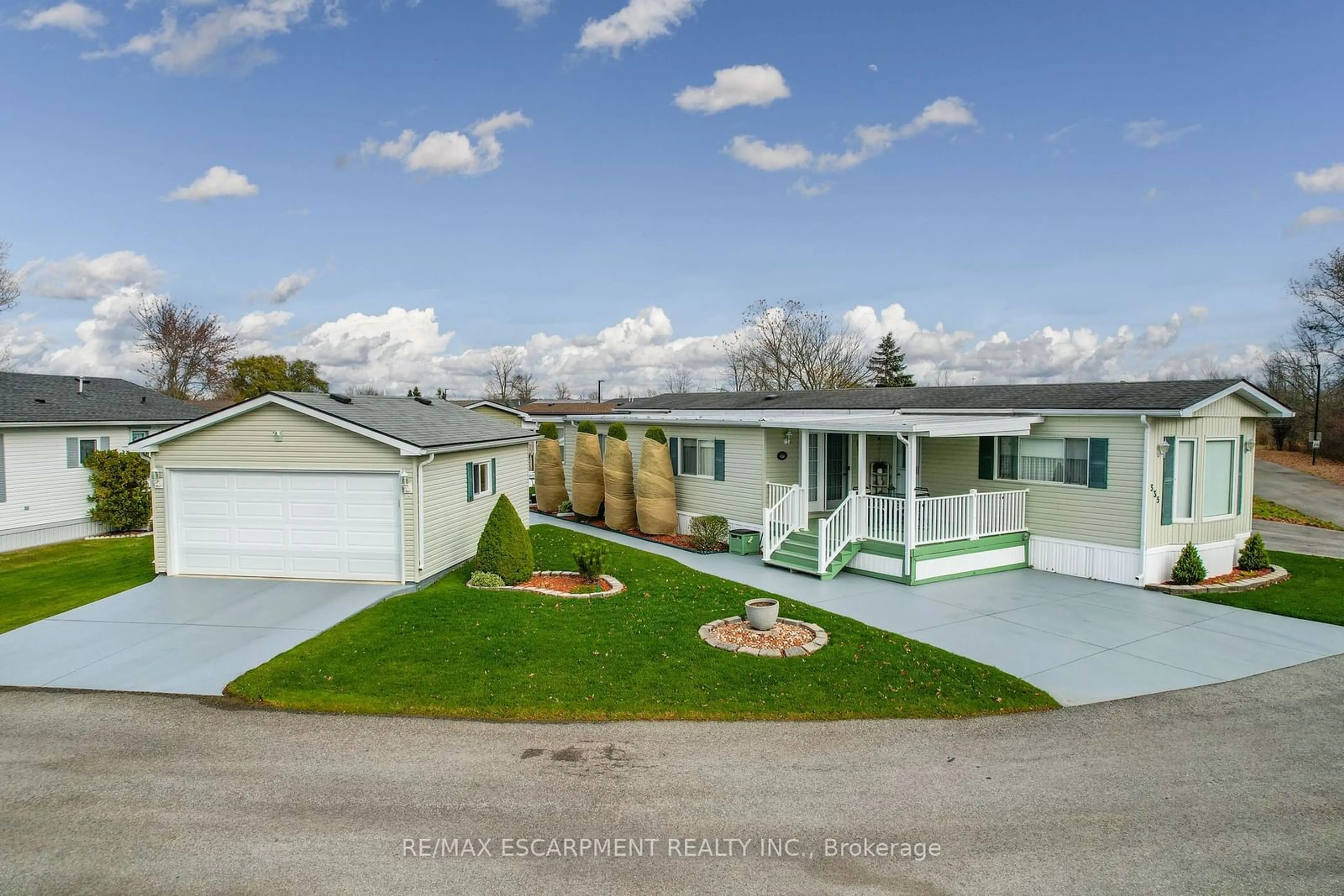 Frontside or backside of a home, the fenced backyard for 3033 Townline Rd #335, Fort Erie Ontario L0S 1S1