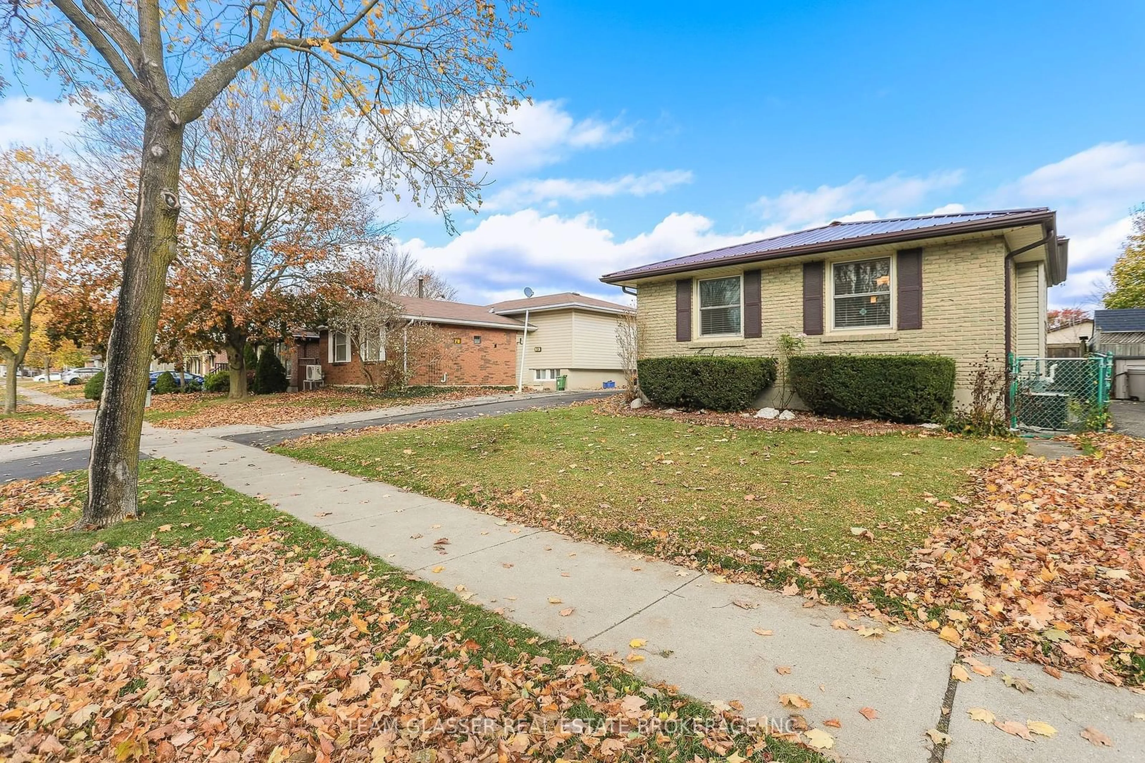 A pic from exterior of the house or condo, the fenced backyard for 808 Dundalk Dr, London Ontario N6C 3V2