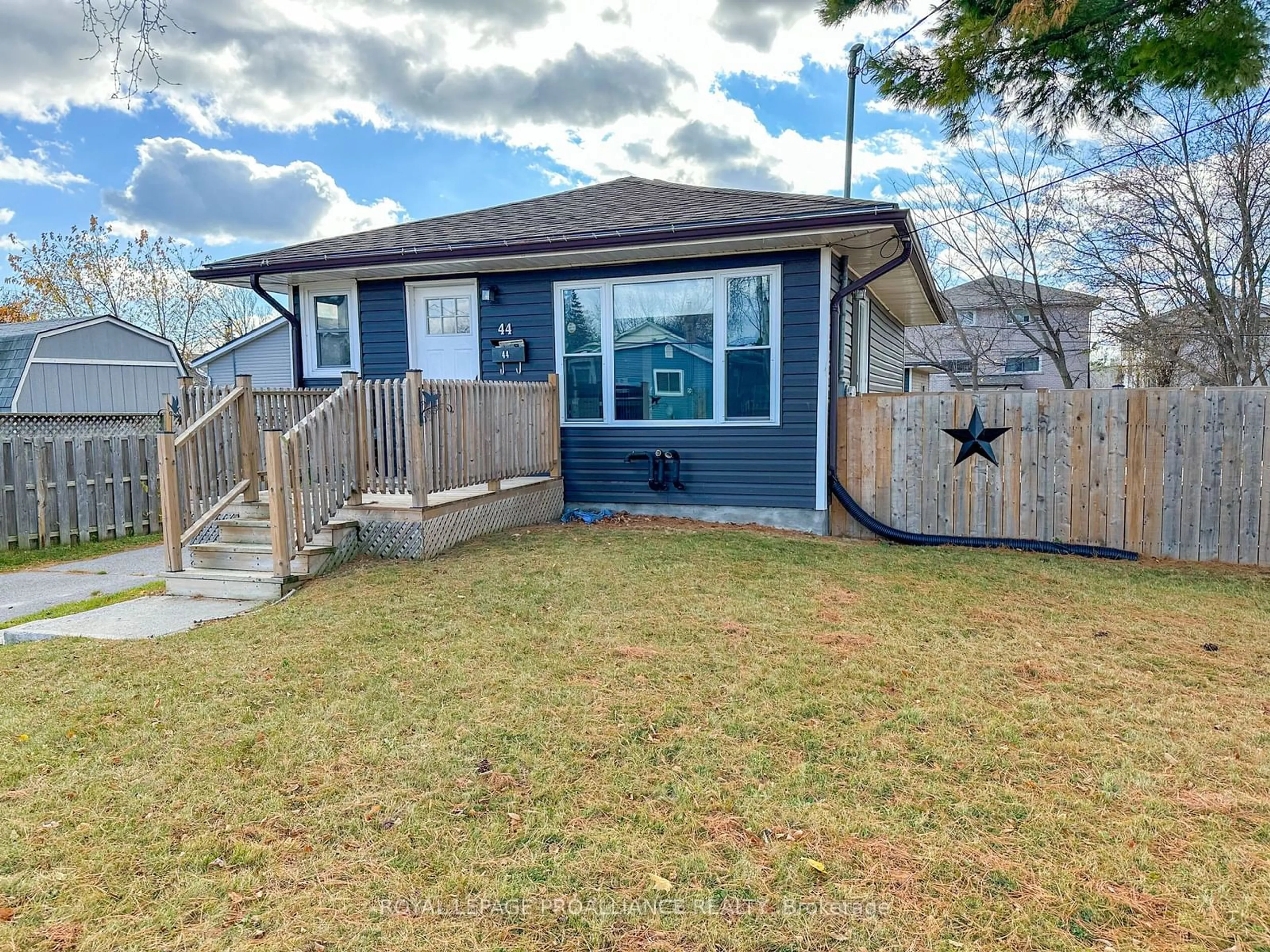 Frontside or backside of a home, the fenced backyard for 44 Leopold St, Quinte West Ontario K8V 2K2