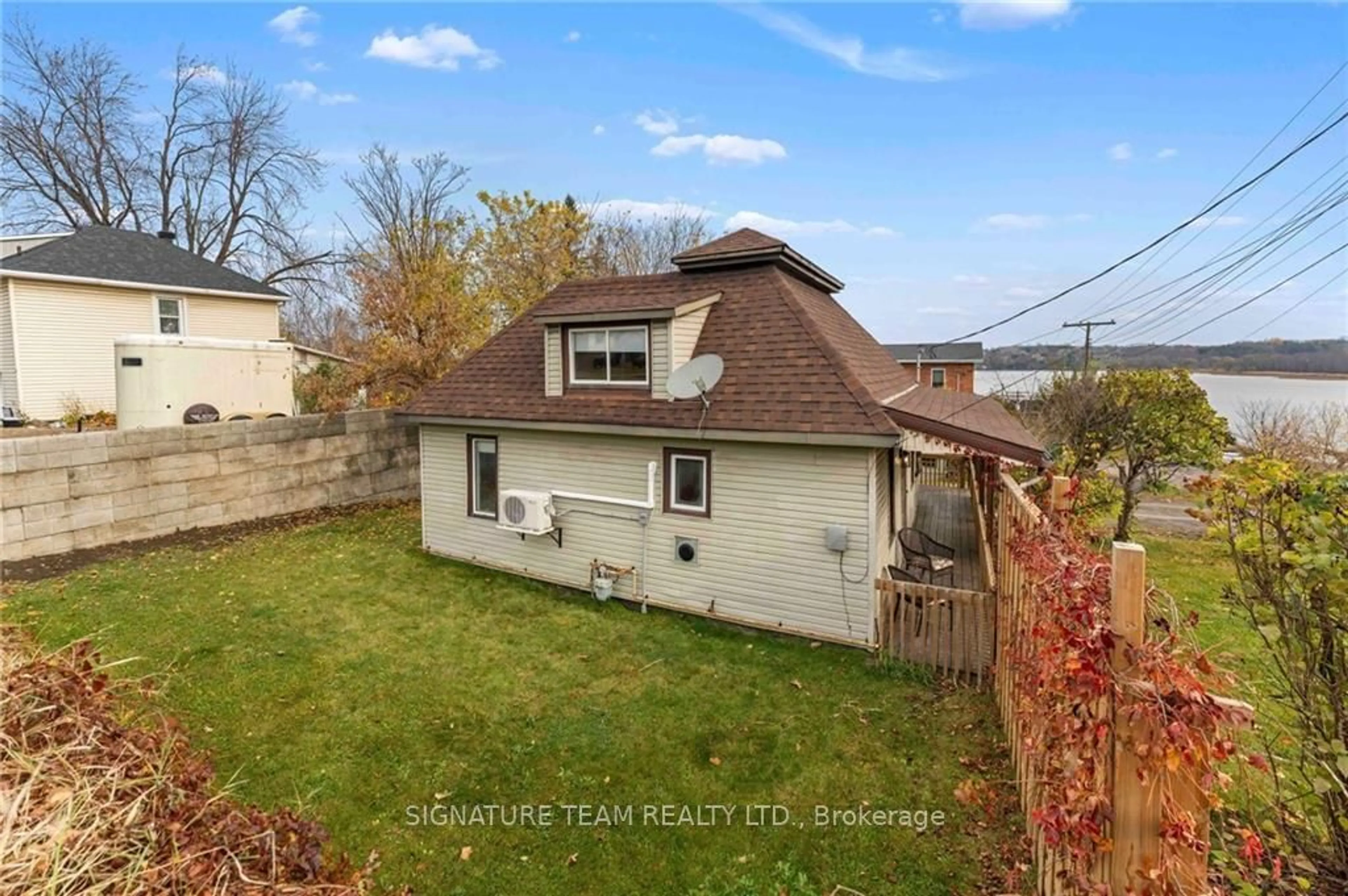 Frontside or backside of a home, the fenced backyard for 8 MAIN St, Whitewater Region Ontario K0J 1K0