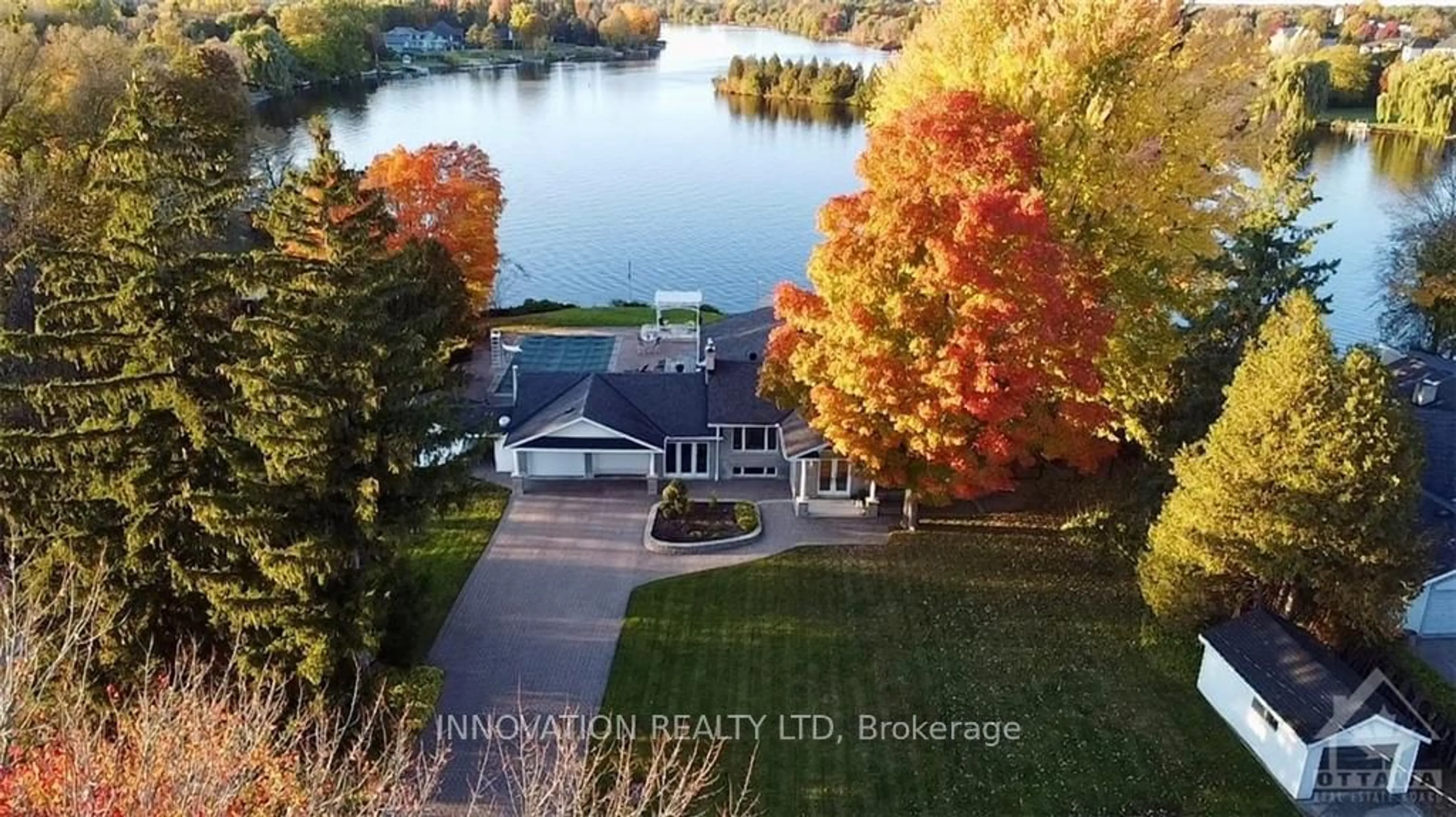 A pic from exterior of the house or condo, lake for 1104 BOUCHER Cres, Manotick - Kars - Rideau Twp and Area Ontario K4M 1B3