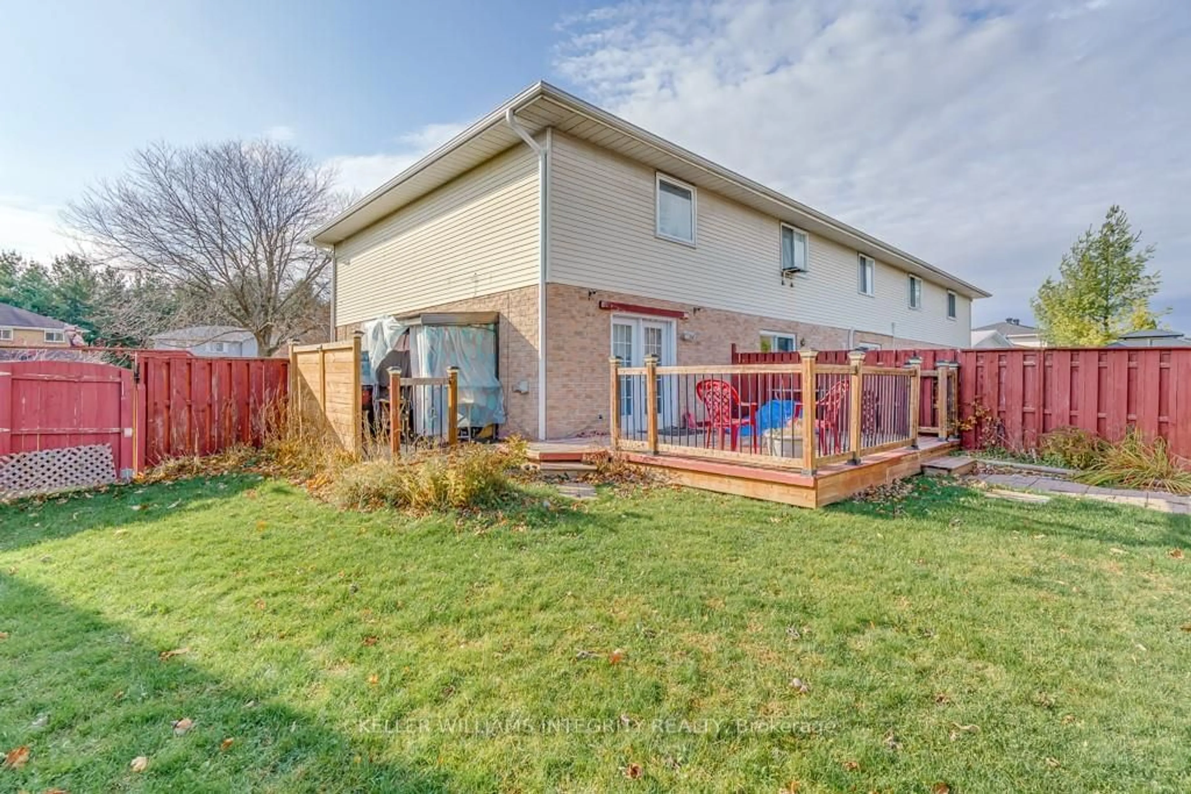 Frontside or backside of a home, the fenced backyard for 720 LYNN St, Cornwall Ontario K6H 7E4