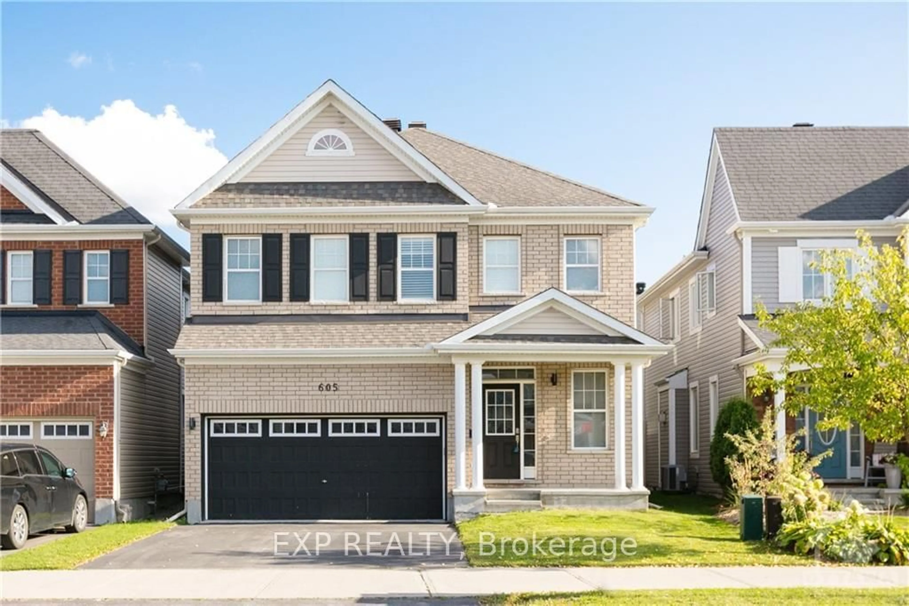 Frontside or backside of a home, the street view for 605 DUNDONALD Dr, Barrhaven Ontario K2J 5Y8