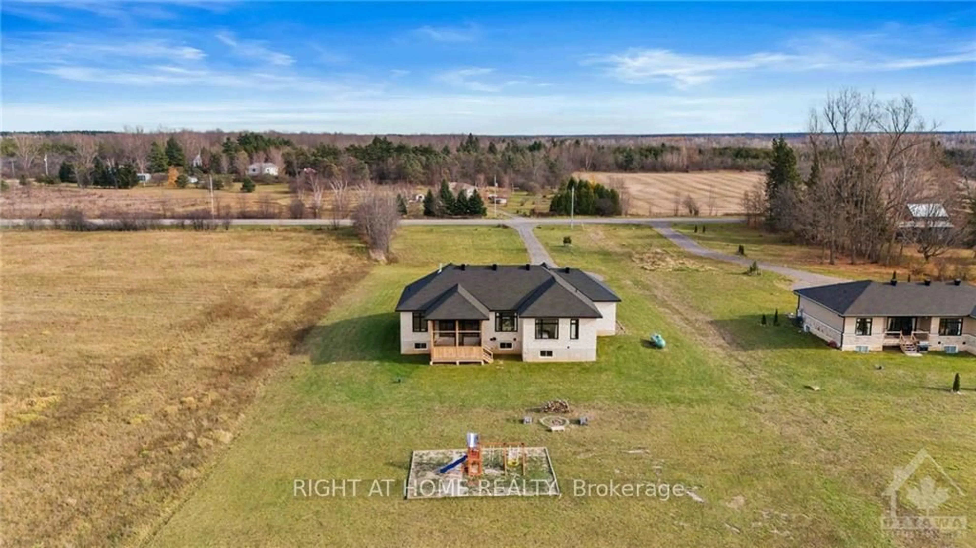 A pic from outside/outdoor area/front of a property/back of a property/a pic from drone, water/lake/river/ocean view for 13708 COUNTY RD 15 Rd, Merrickville-Wolford Ontario K0G 1N0