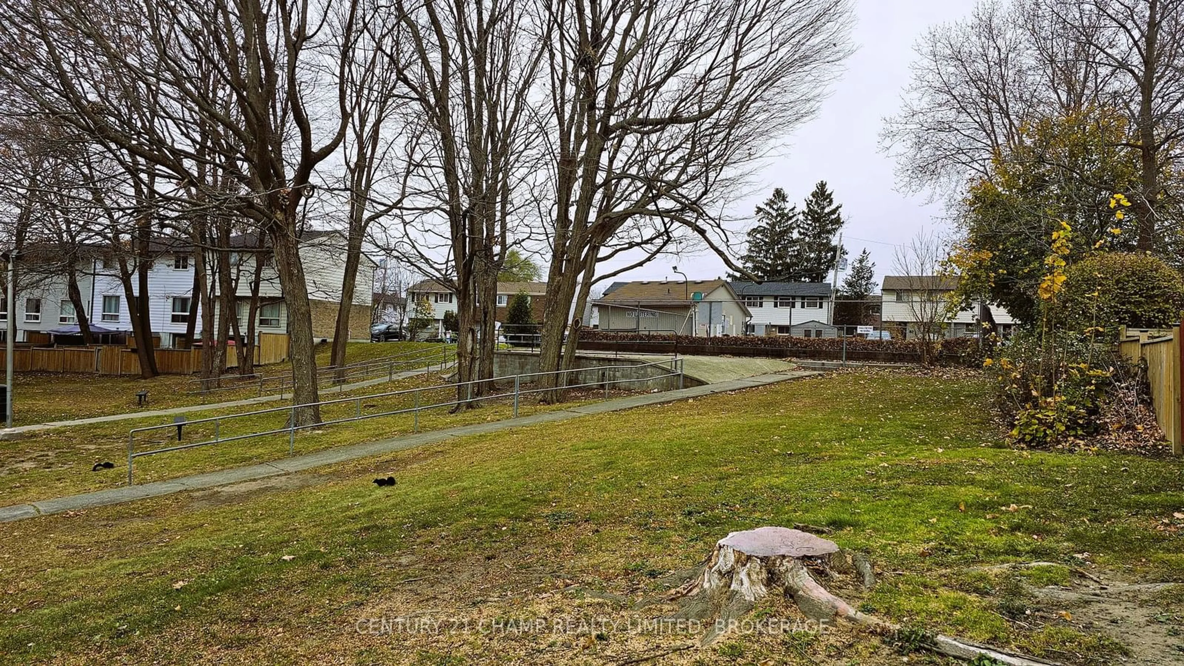 Frontside or backside of a home, the fenced backyard for 896 Oakview Ave #117, Kingston Ontario K7M 6V6