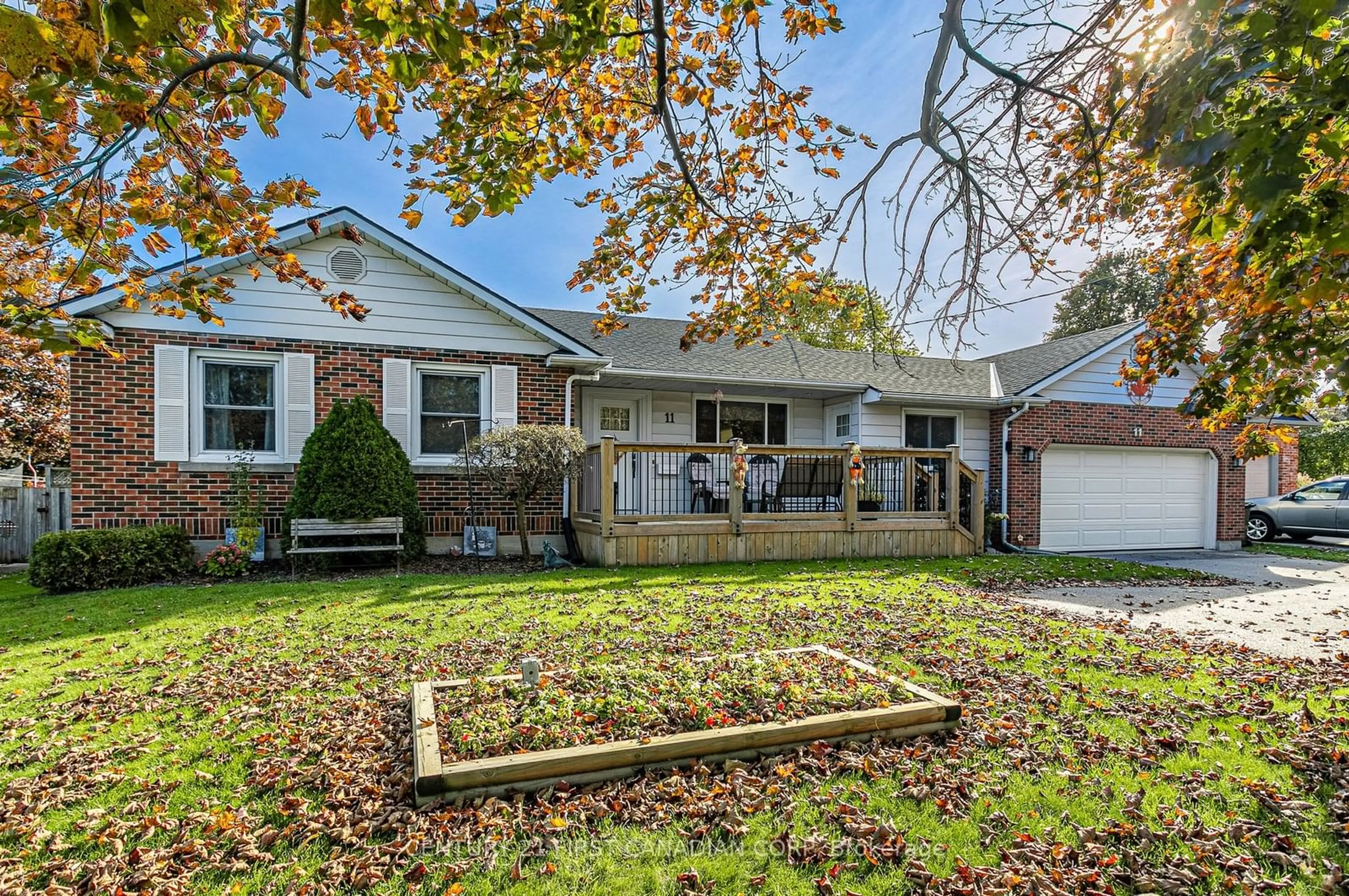 Frontside or backside of a home, the fenced backyard for 11 Fairview Ave, St. Thomas Ontario N5R 4X2