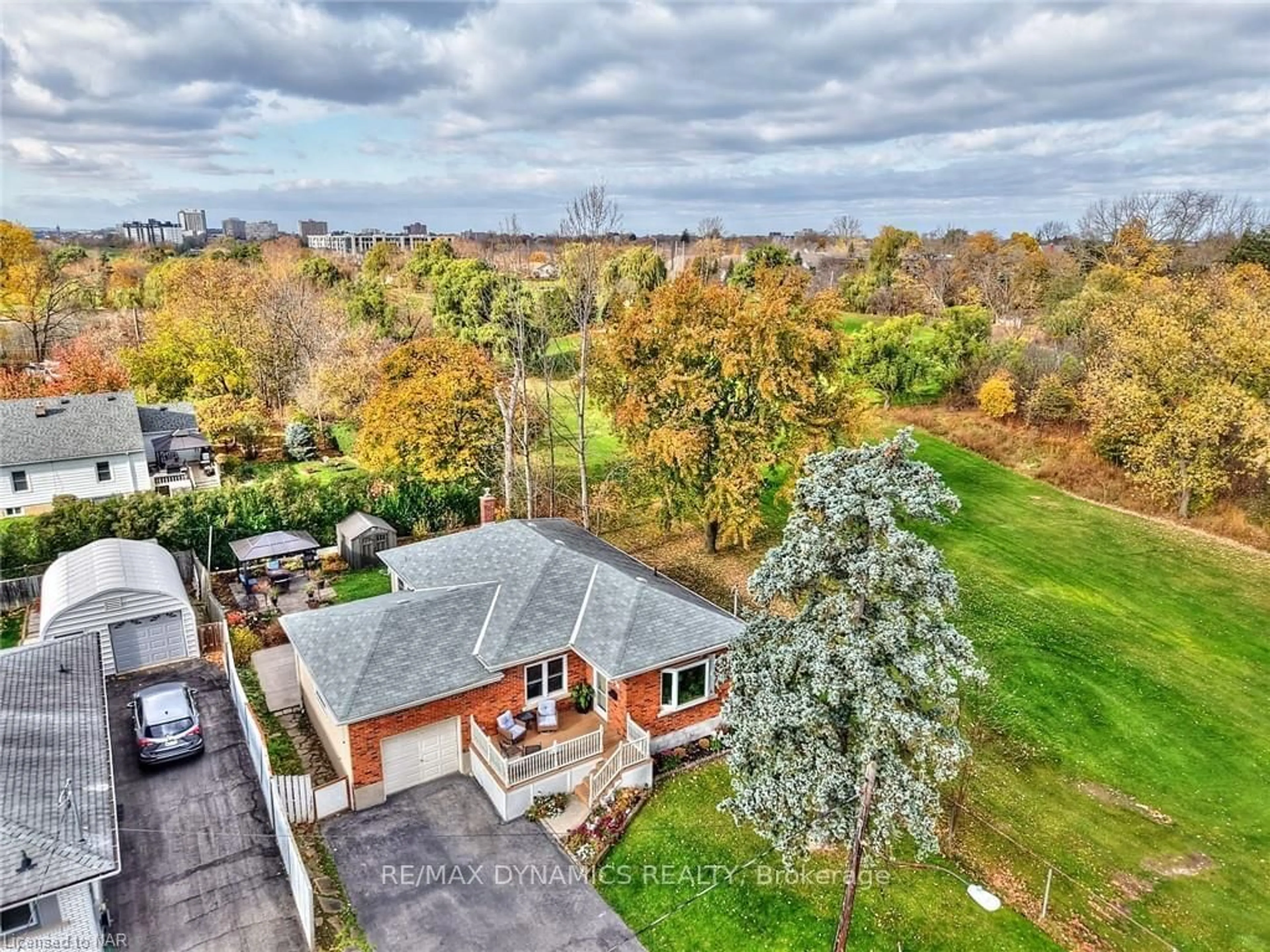 A pic from exterior of the house or condo, the fenced backyard for 19 MELROSE Ave, St. Catharines Ontario L2P 2E3