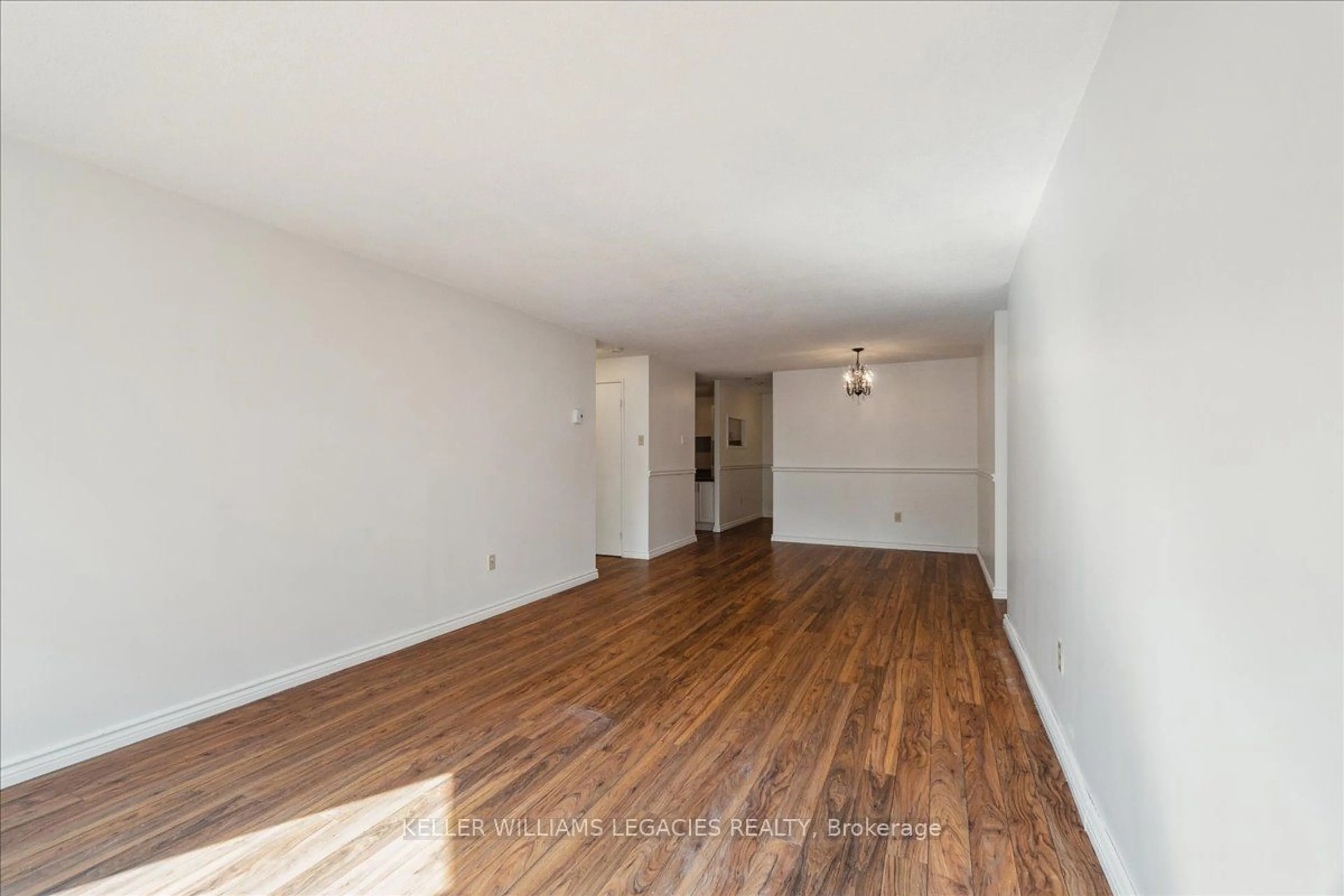 A pic of a room, wood floors for 55 Green Valley Dr #801, Kitchener Ontario N2P 1Z6