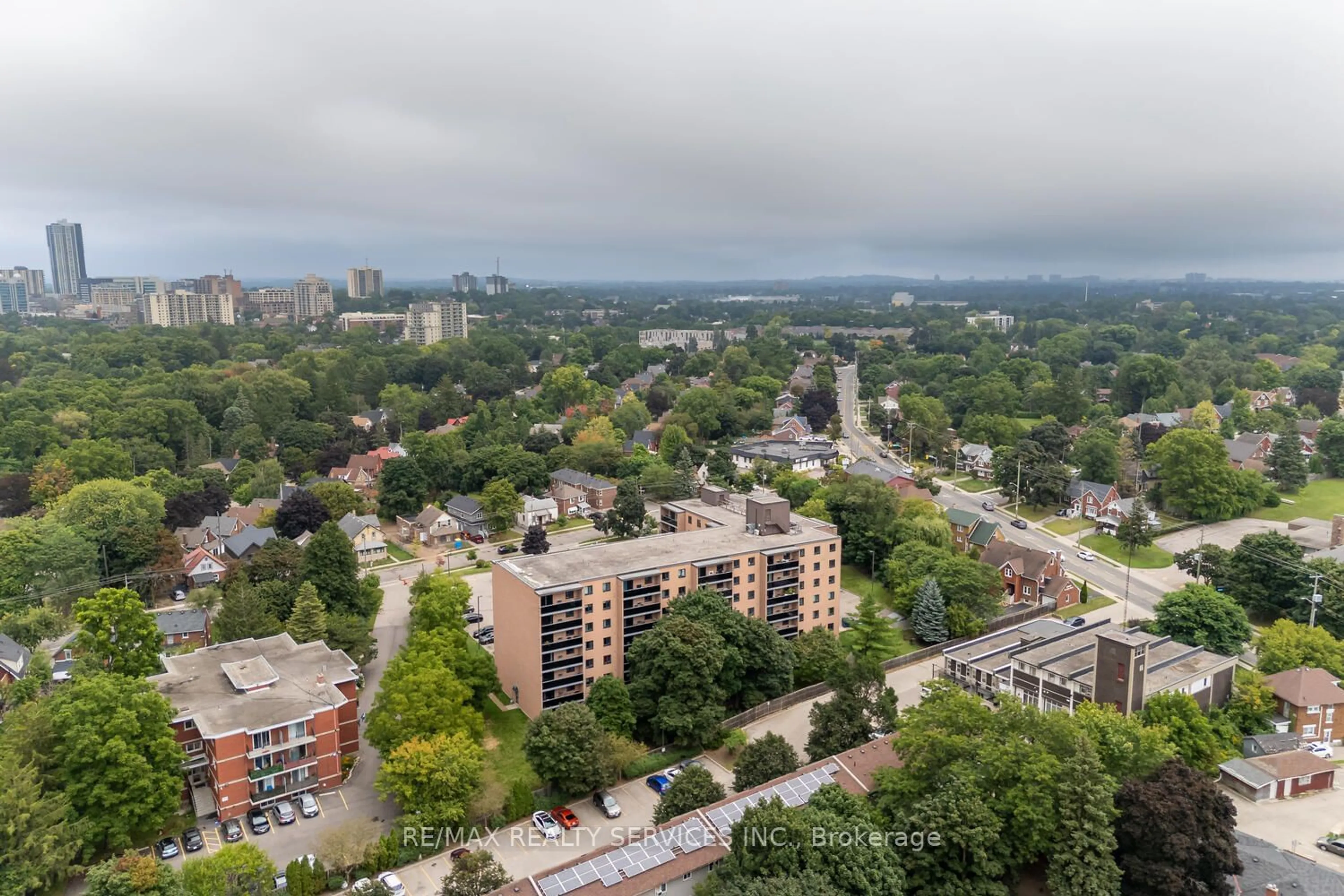 A pic from exterior of the house or condo, the view of city buildings for 29 West Ave #302, Kitchener Ontario N2M 5E4