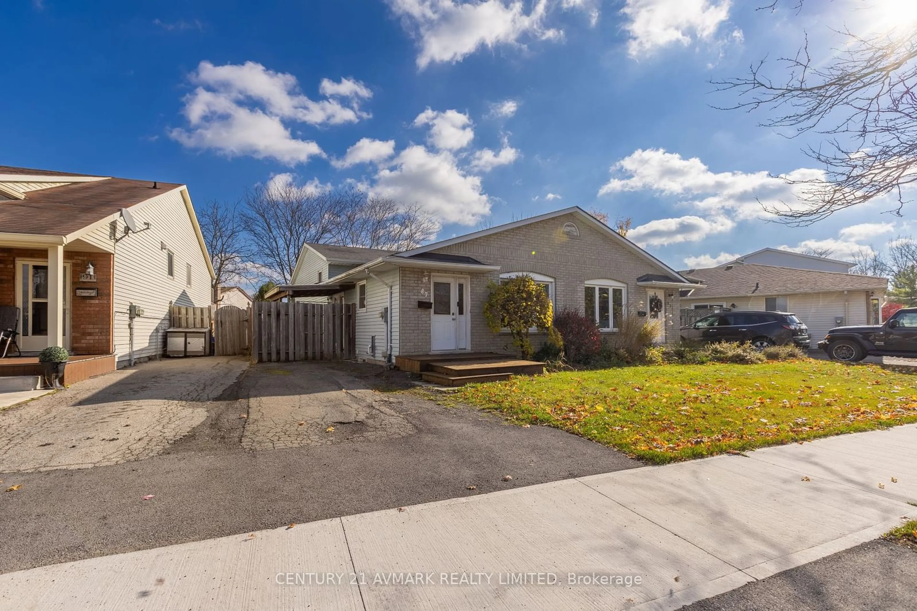 Frontside or backside of a home, the fenced backyard for 87 Terrace Ave, Welland Ontario L3C 6K1