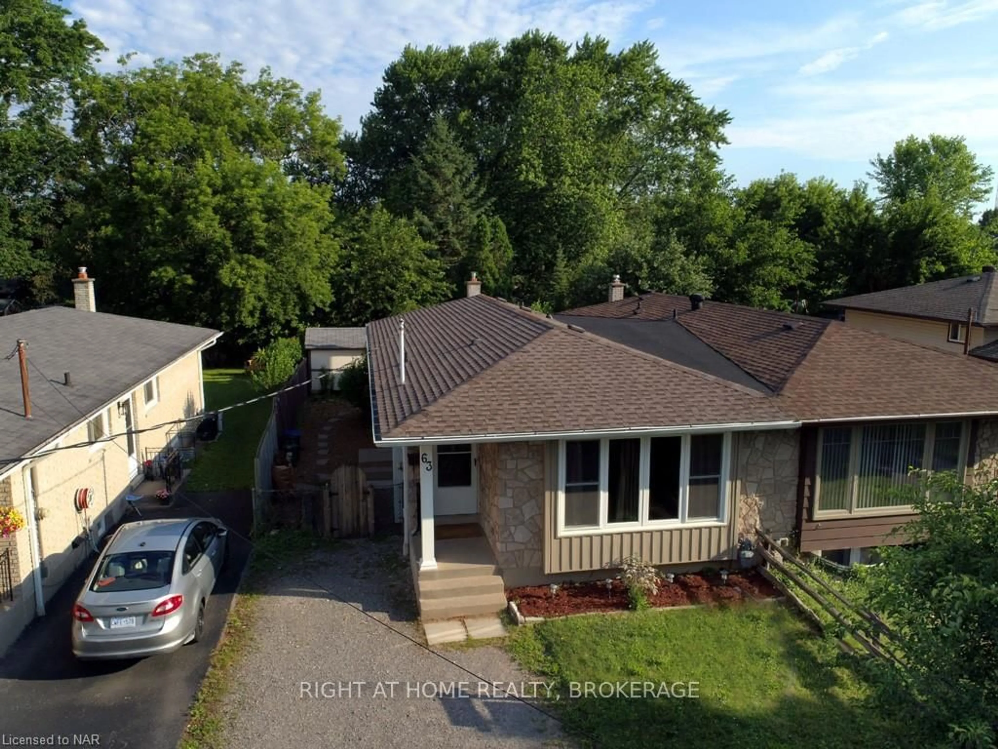 Frontside or backside of a home, the street view for 63 LOUIS Ave, St. Catharines Ontario L2M 2N4