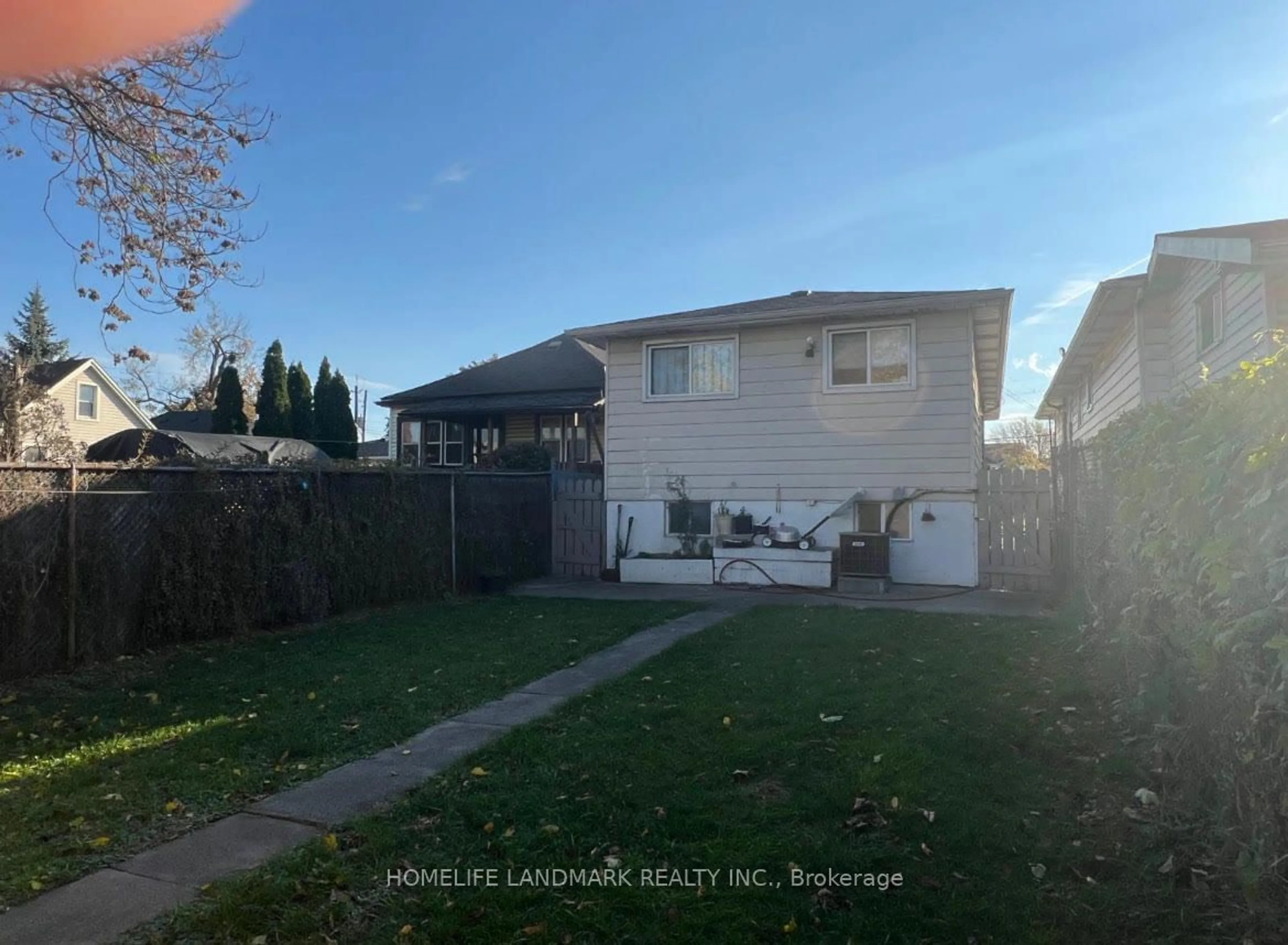 Frontside or backside of a home, the fenced backyard for 47 Martimas Ave, Hamilton Ontario L8H 3N1