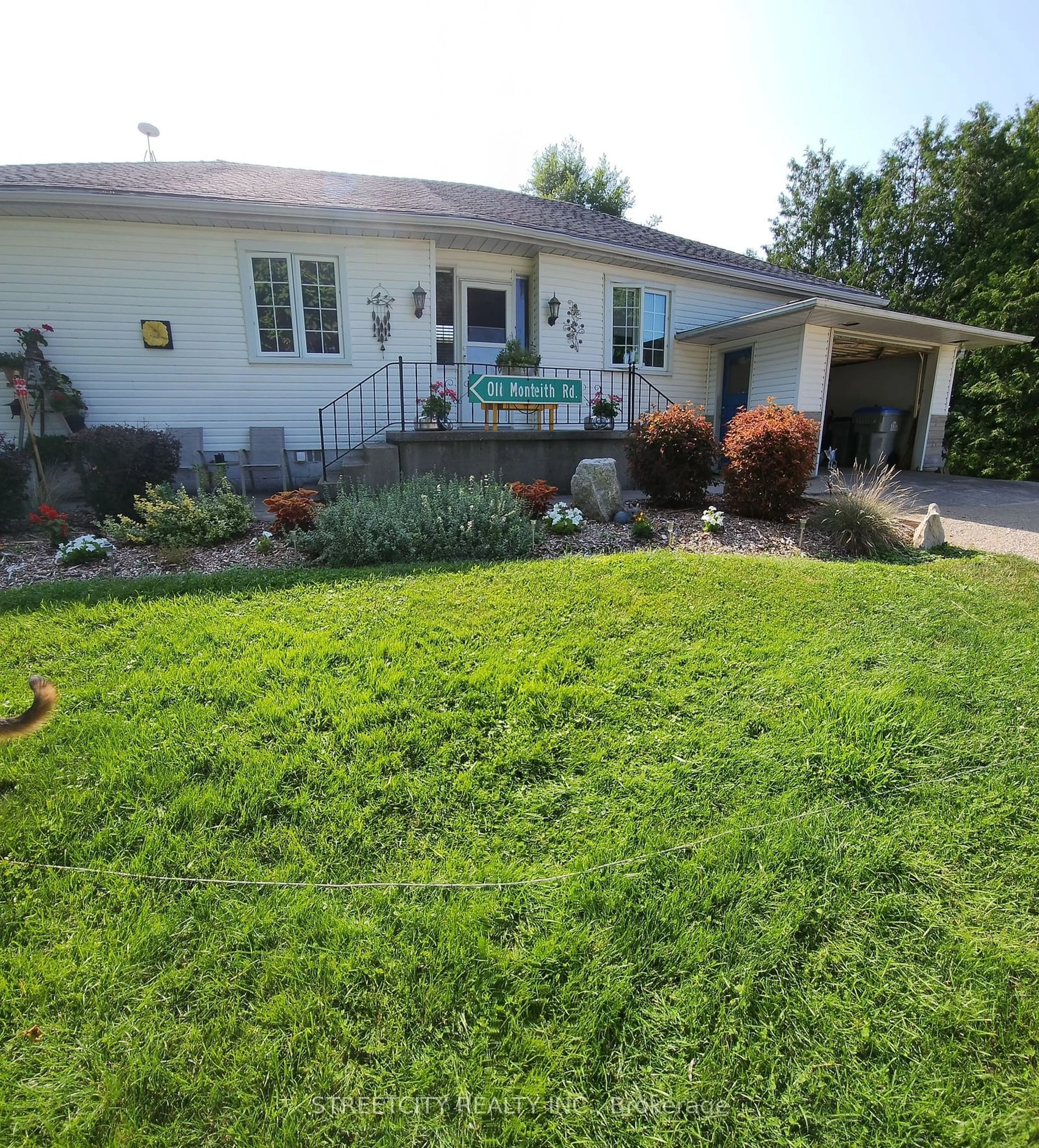 Frontside or backside of a home, the fenced backyard for 69889 Parr Line, South Huron Ontario N0M 1M0