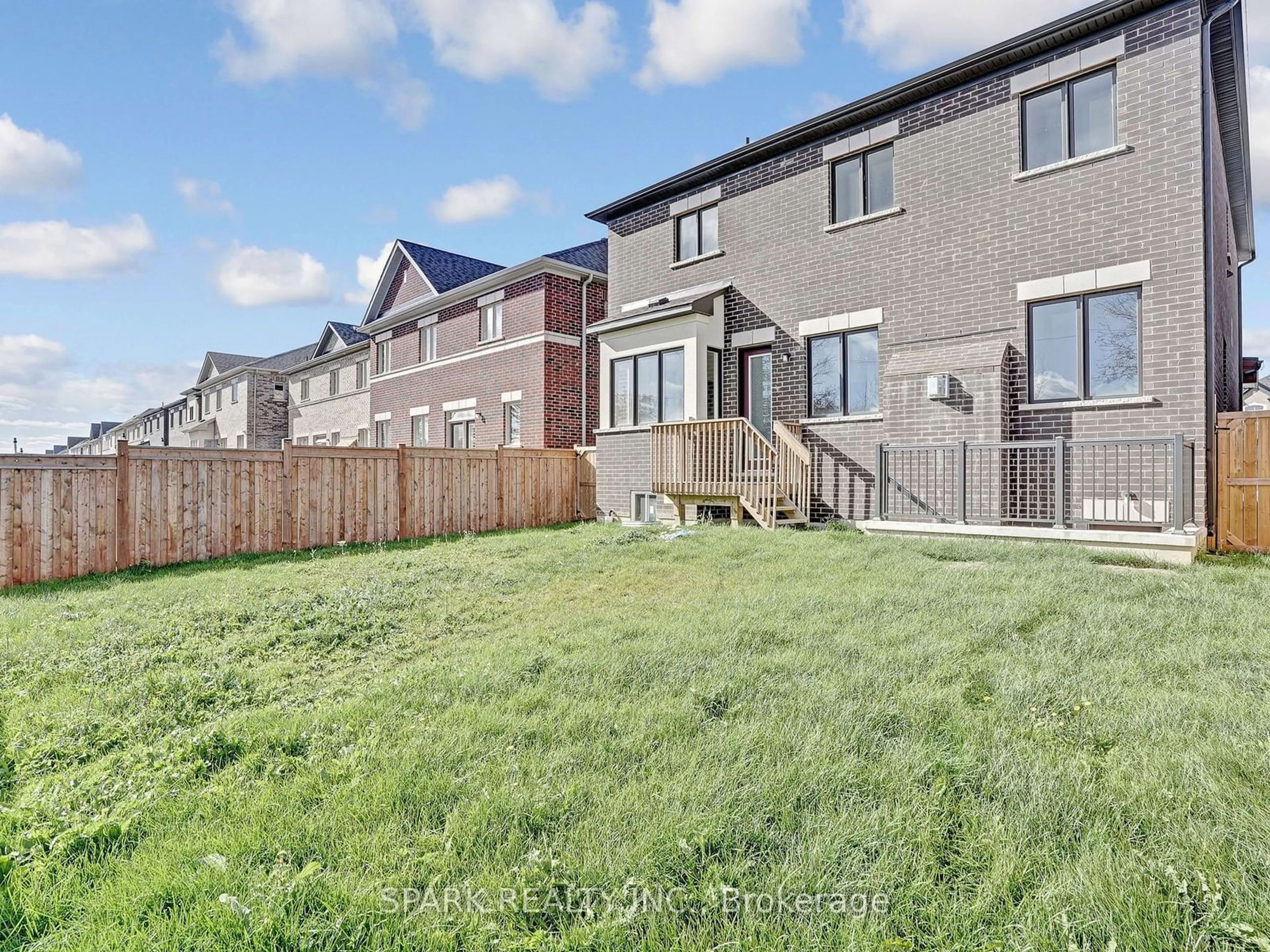 Frontside or backside of a home, the fenced backyard for 76 Elstone Pl, Hamilton Ontario L0R 2H7