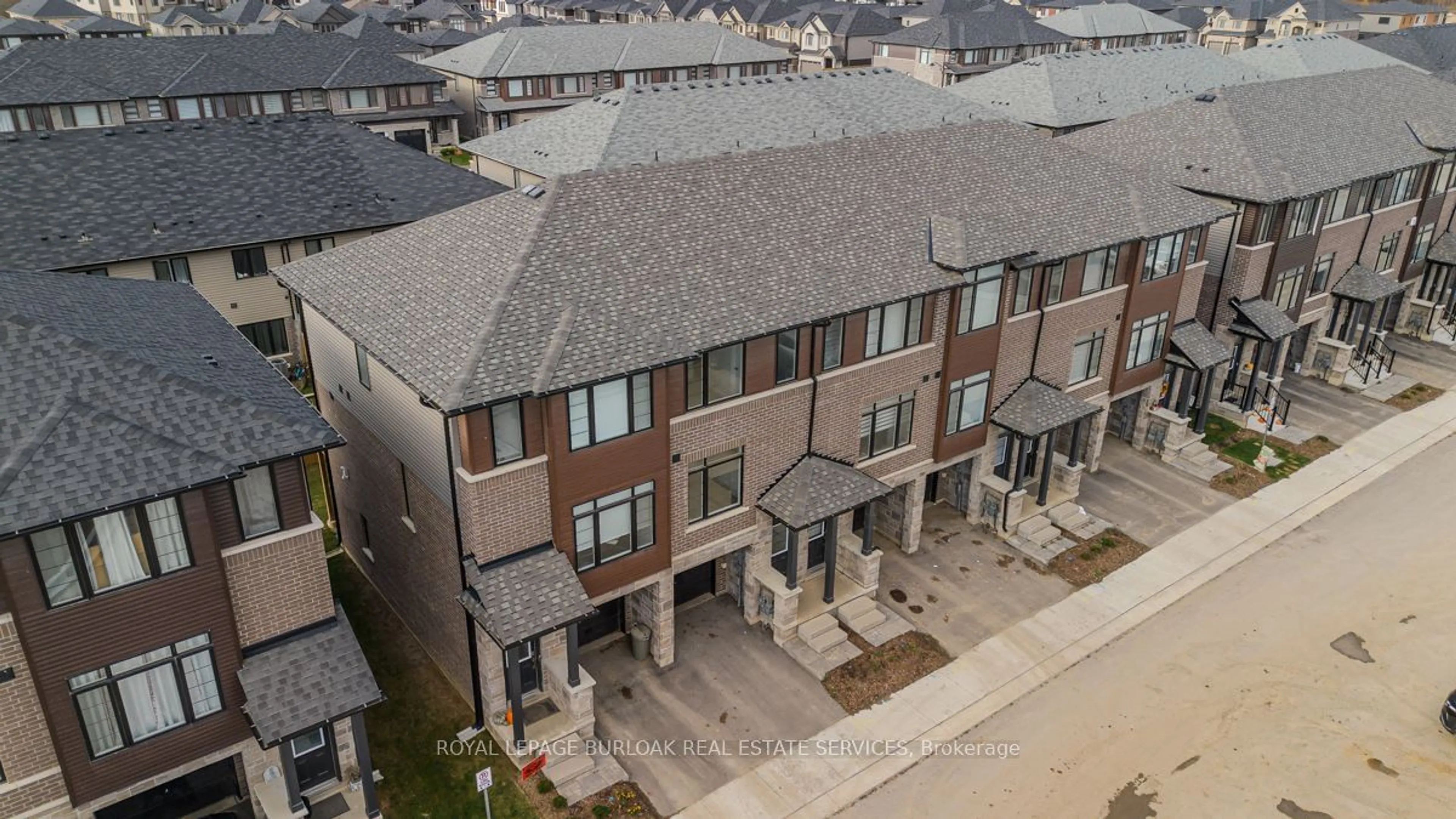 A pic from exterior of the house or condo, the street view for 461 Blackburn Dr #56, Brantford Ontario N3T 0W9