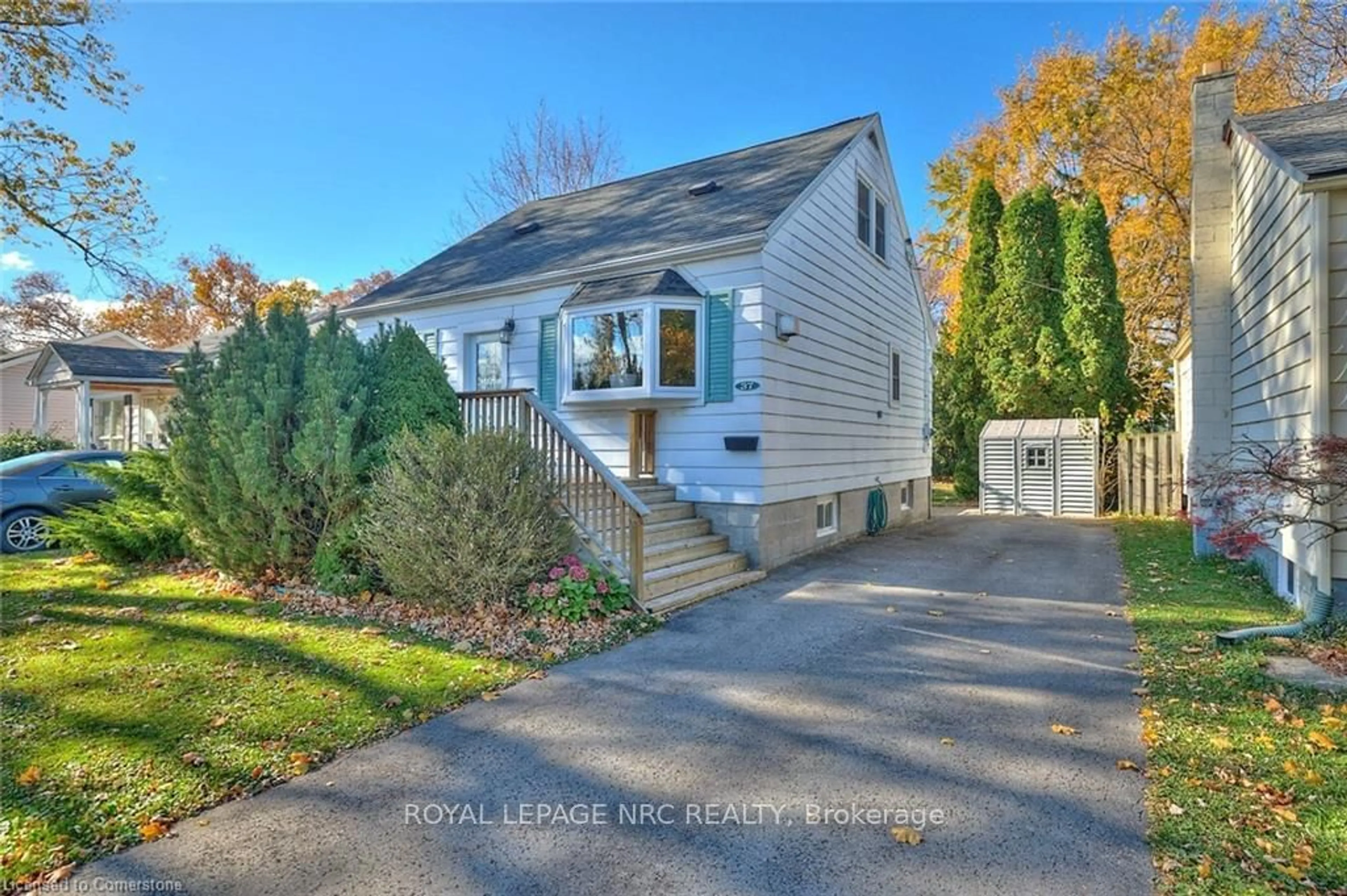 A pic from exterior of the house or condo, the fenced backyard for 37 Shakespeare Ave, St. Catharines Ontario L2R 6M8