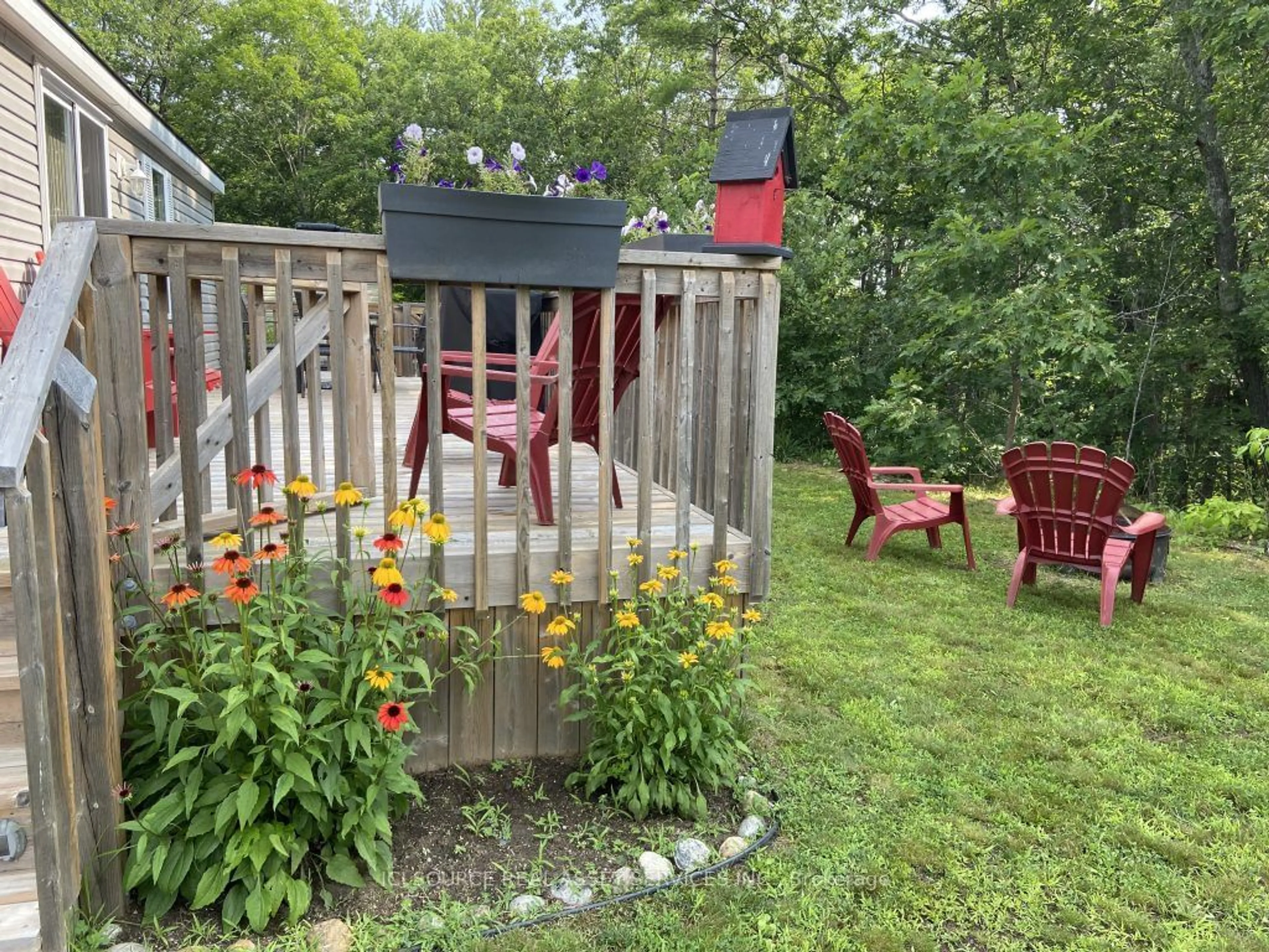 Patio, the fenced backyard for 1336 S Morrison Lake Rd #MOR026, Muskoka Lakes Ontario P0E 1G0