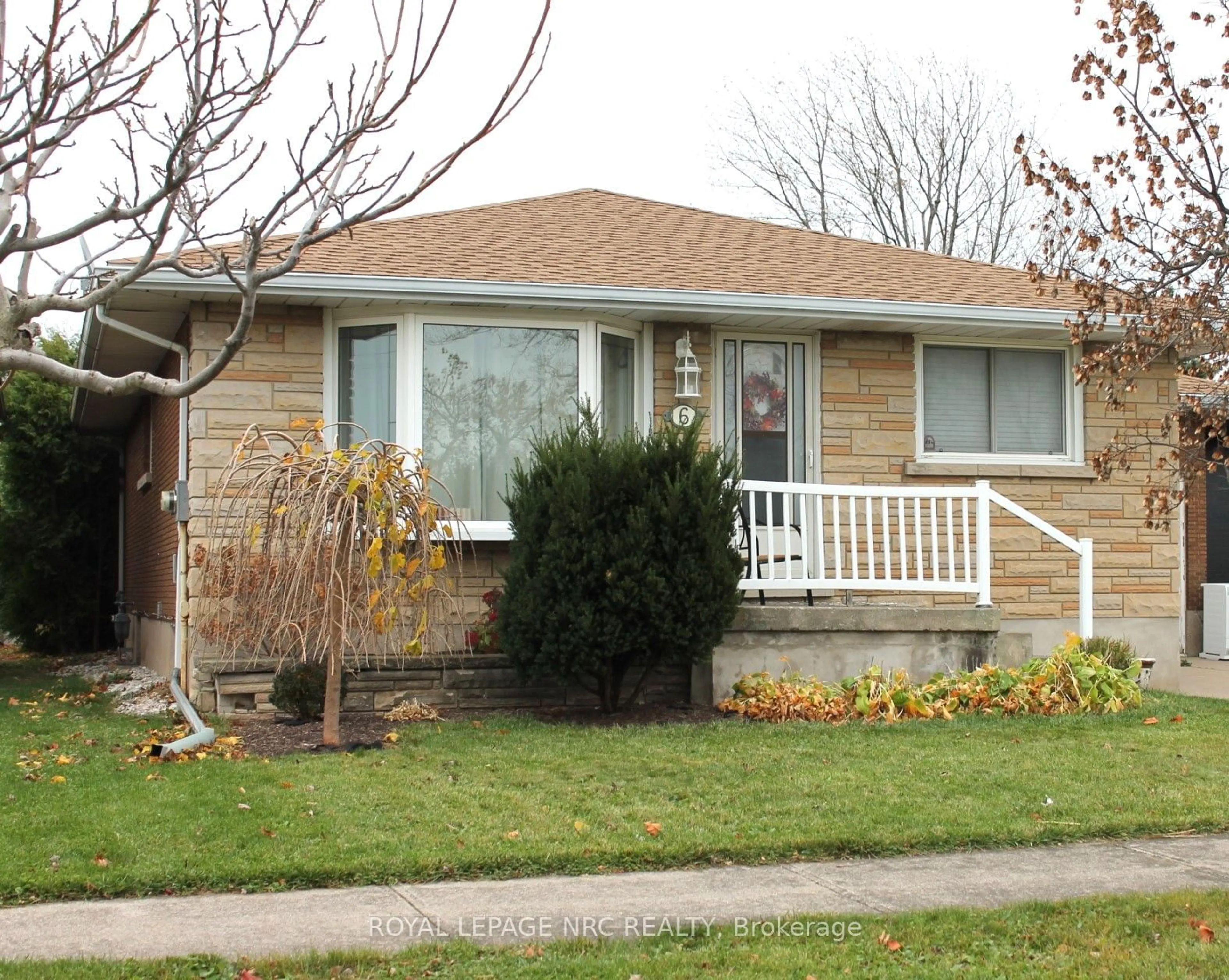 Frontside or backside of a home, the street view for 6 Park Ave, St. Catharines Ontario L2P 1R1