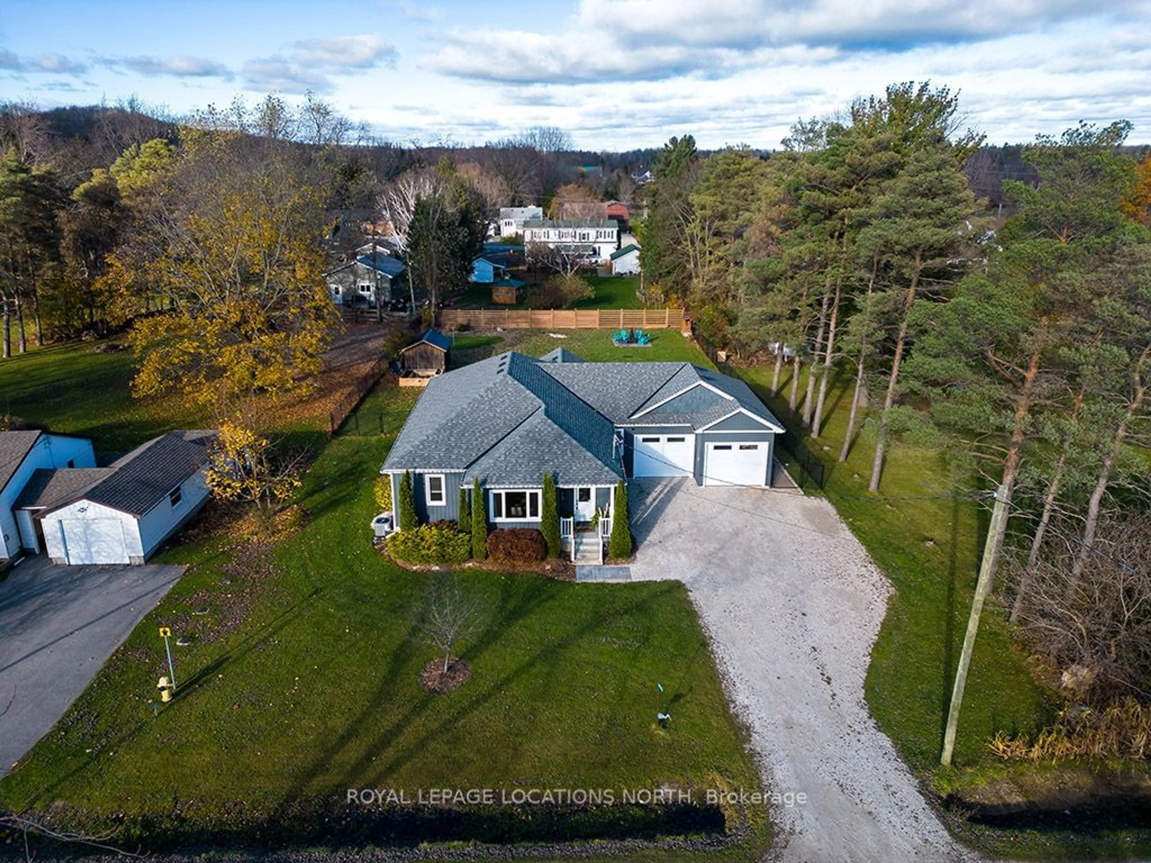 Frontside or backside of a home, cottage for 879 15th St, Georgian Bluffs Ontario N4X 6V5