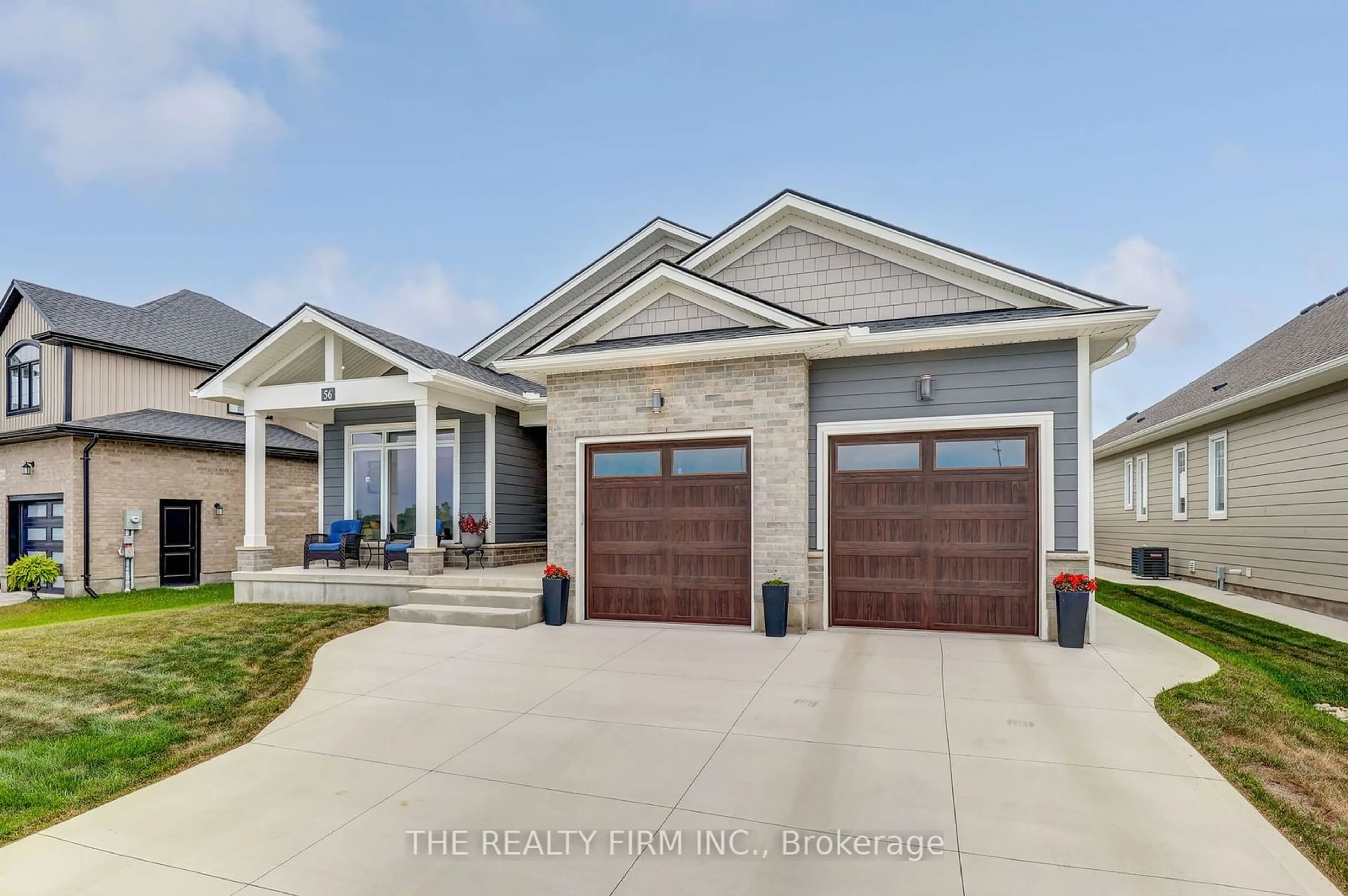 Frontside or backside of a home, the street view for 56 Optimist Dr, Southwold Ontario N5P 3T2