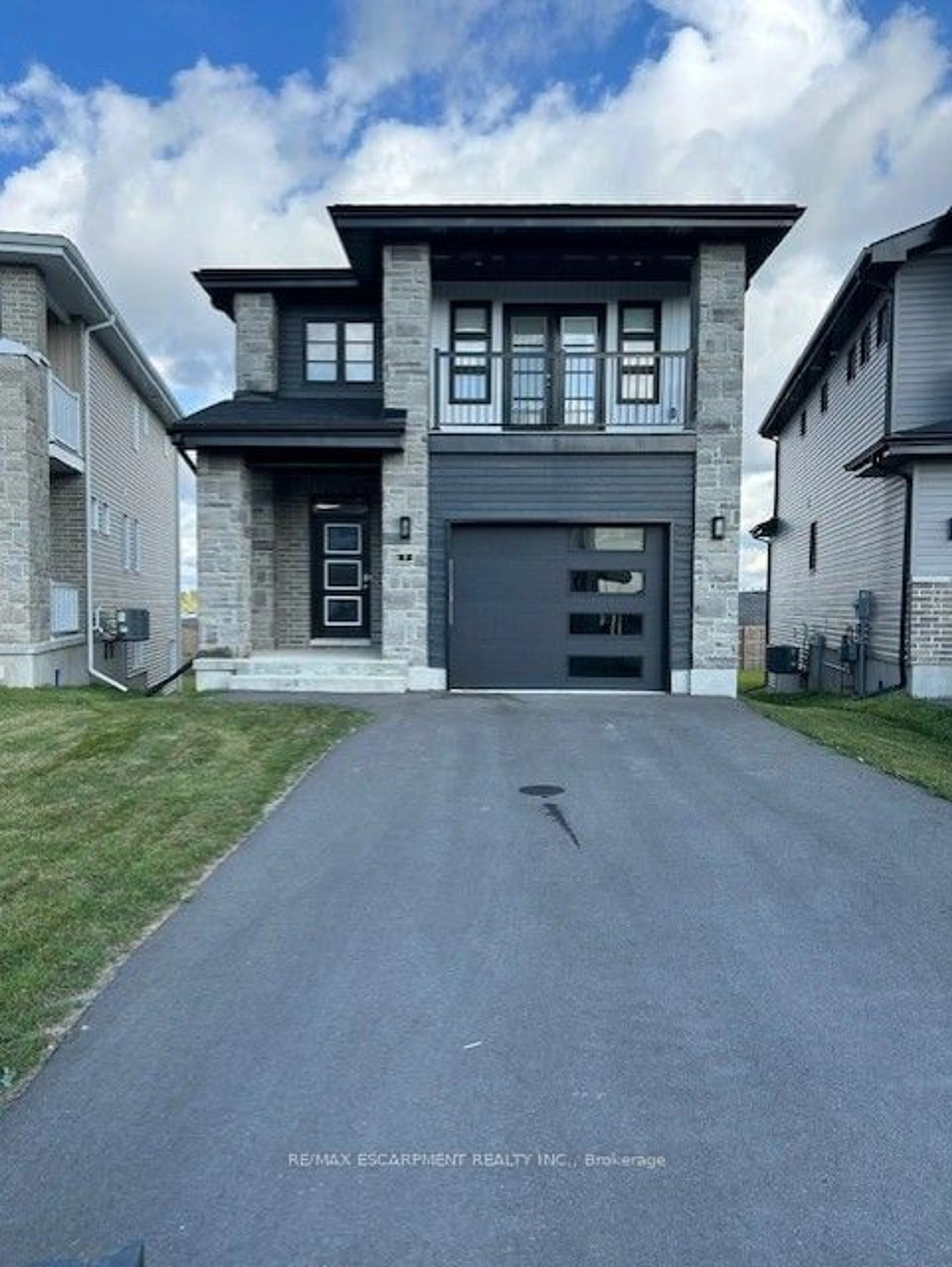 Frontside or backside of a home, the street view for 7 Erie Crt, Loyalist Ontario K0H 1G0