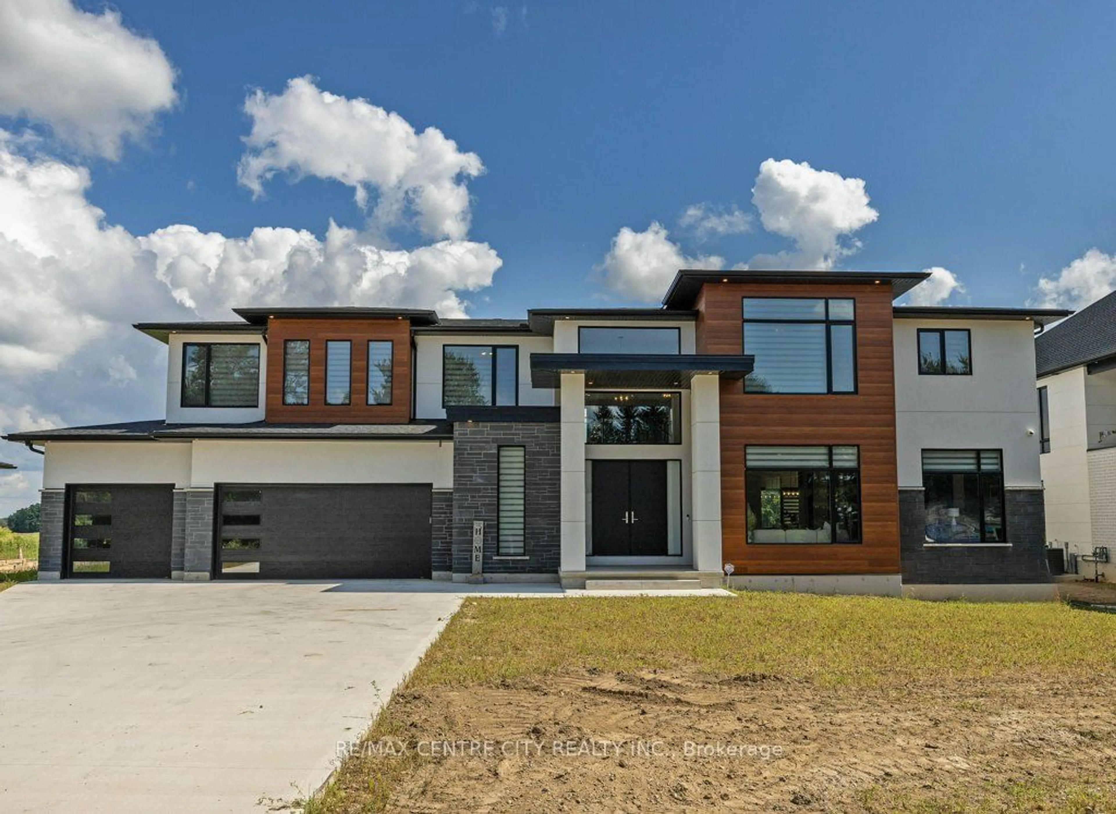 Frontside or backside of a home, the street view for 15353 Plover Mills Rd, Middlesex Centre Ontario N0M 2A0