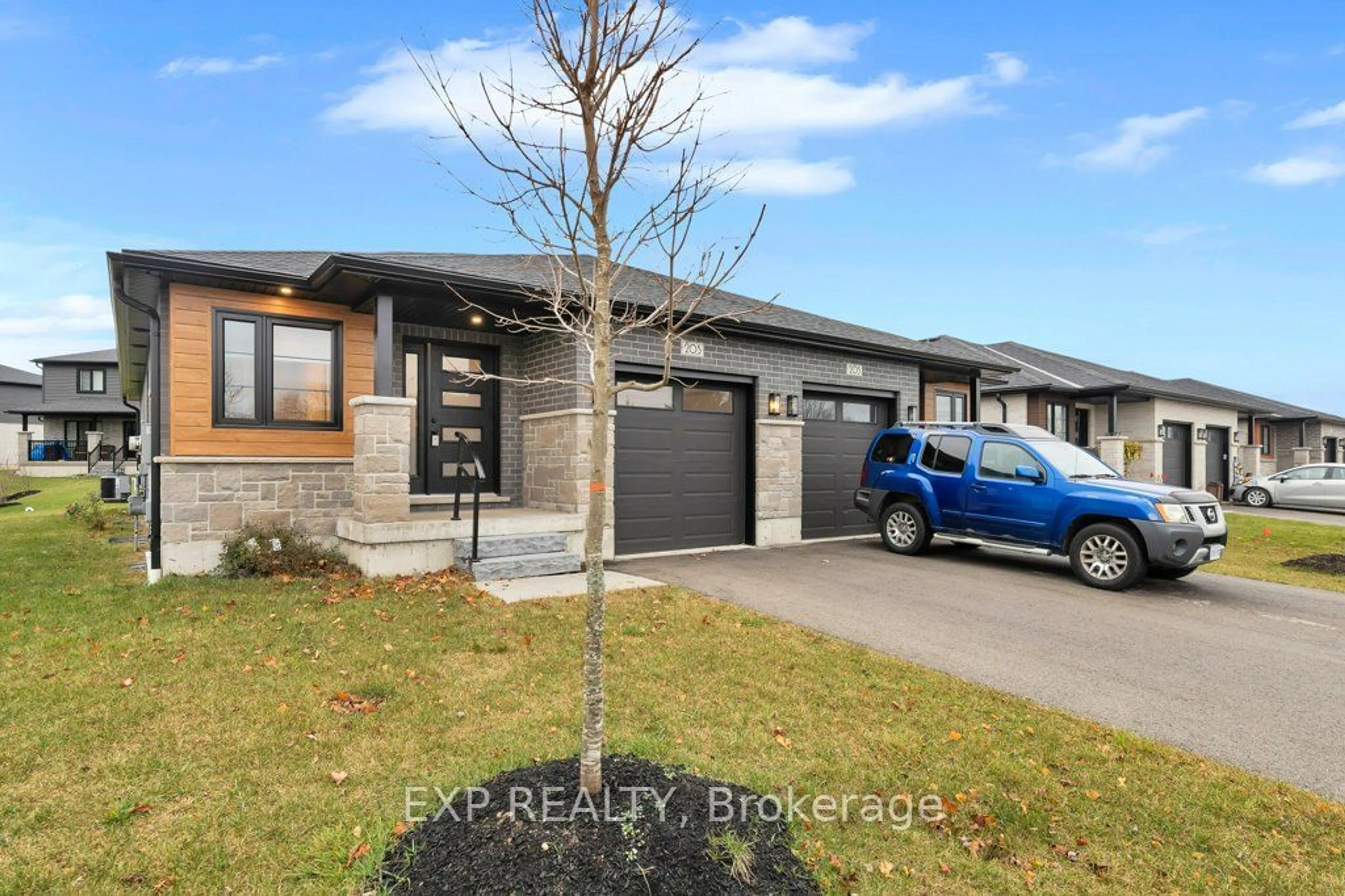 Frontside or backside of a home, the street view for 203 Church St, Wellington North Ontario N0G 2L2