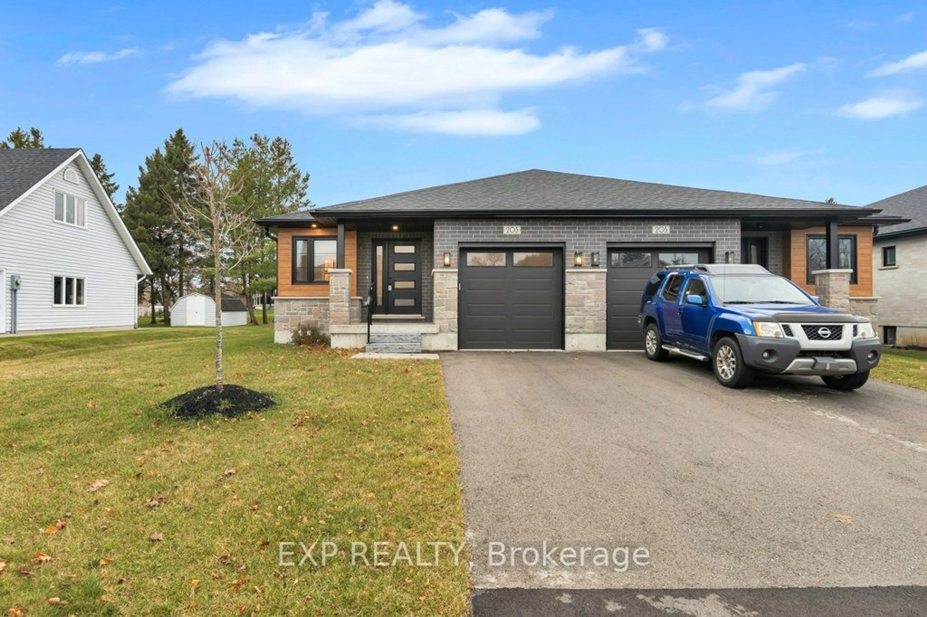 Frontside or backside of a home, cottage for 203 Church St, Wellington North Ontario N0G 2L2