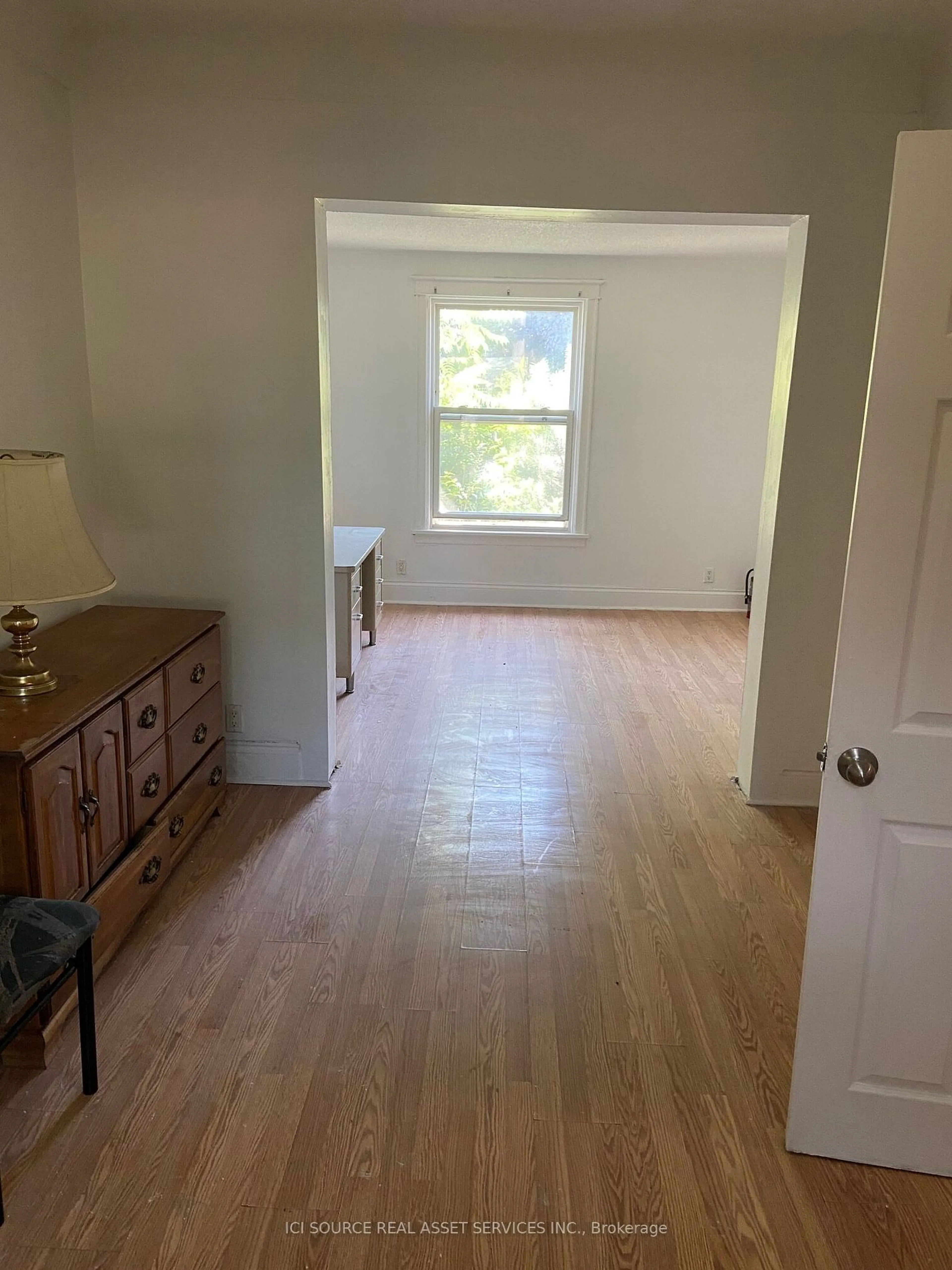 A pic of a room, wood floors for 673 Wilson St, Hamilton Ontario L8L 1V4