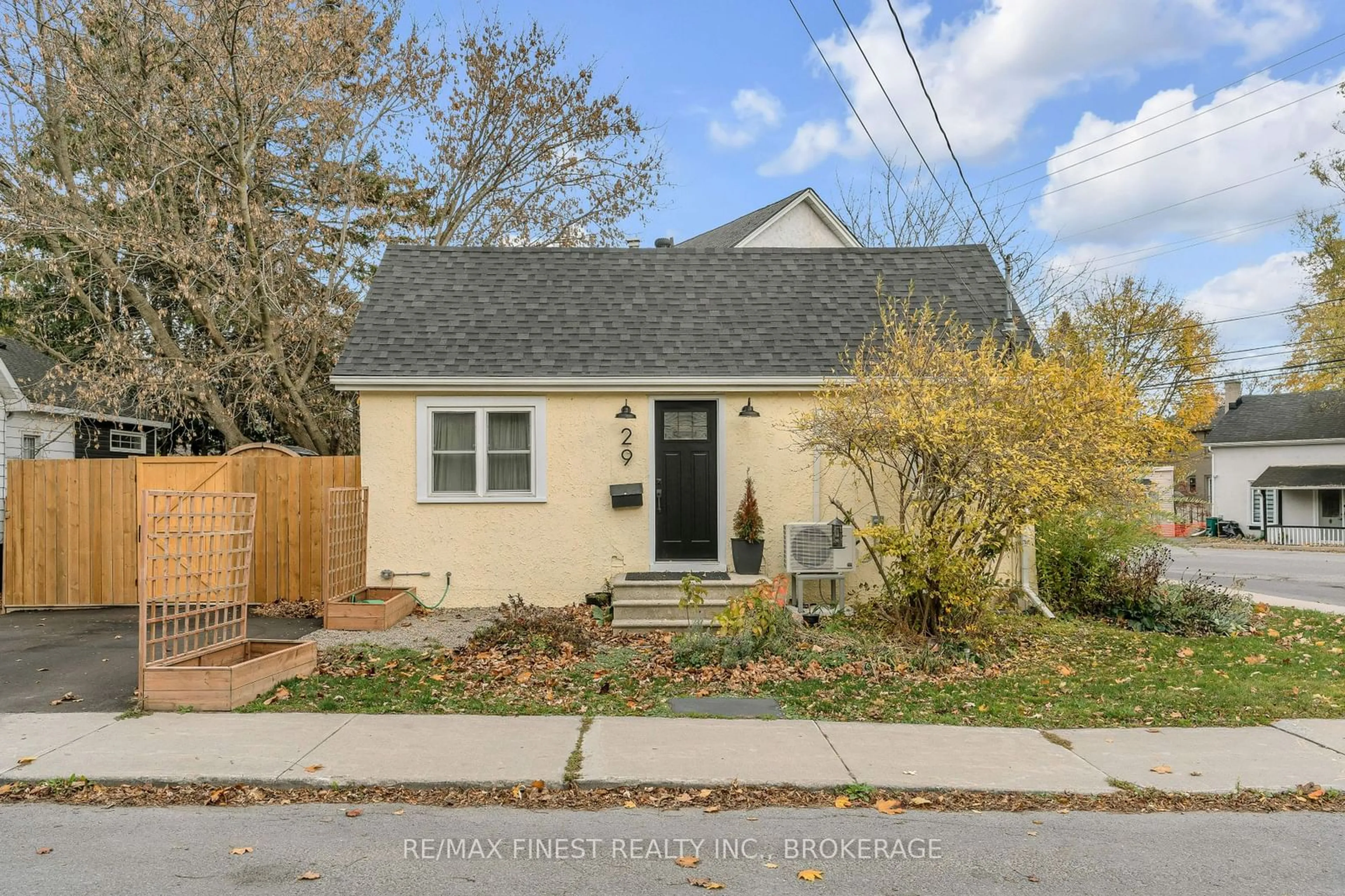 Frontside or backside of a home, the fenced backyard for 29 Church St, Kingston Ontario K7M 1H2