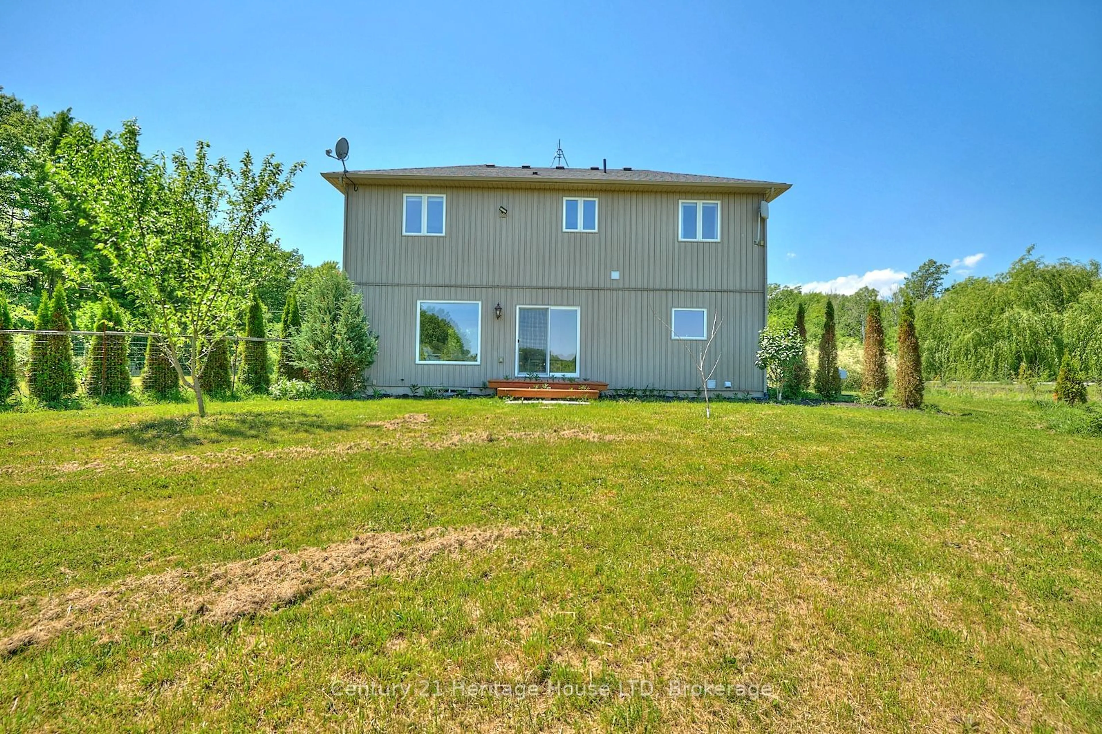 A pic from exterior of the house or condo, the fenced backyard for 51267 Tunnacliffe Rd, Wainfleet Ontario L3B 5N6