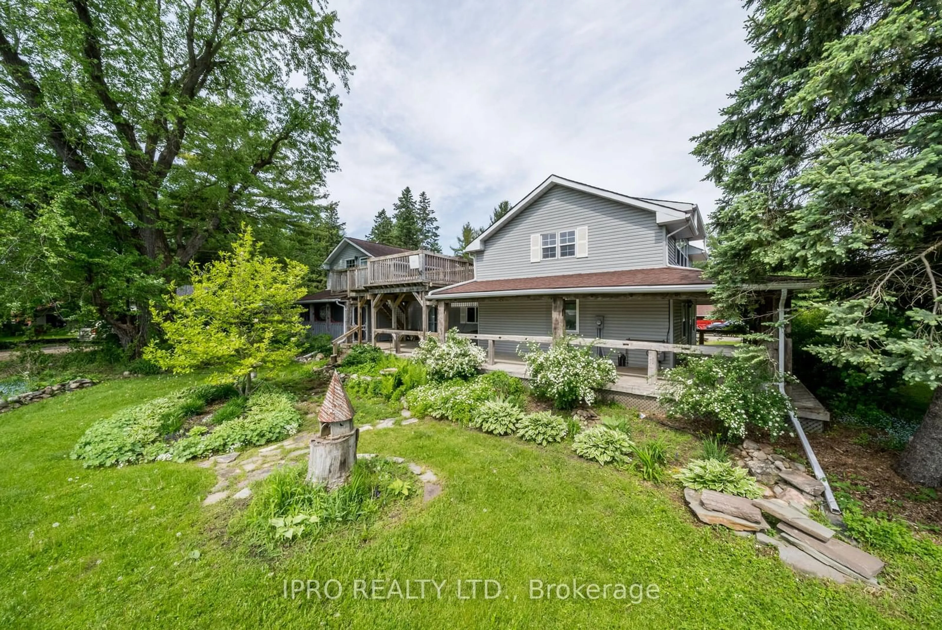 Frontside or backside of a home, the fenced backyard for 5390 8th Line, Erin Ontario N0B 1T0