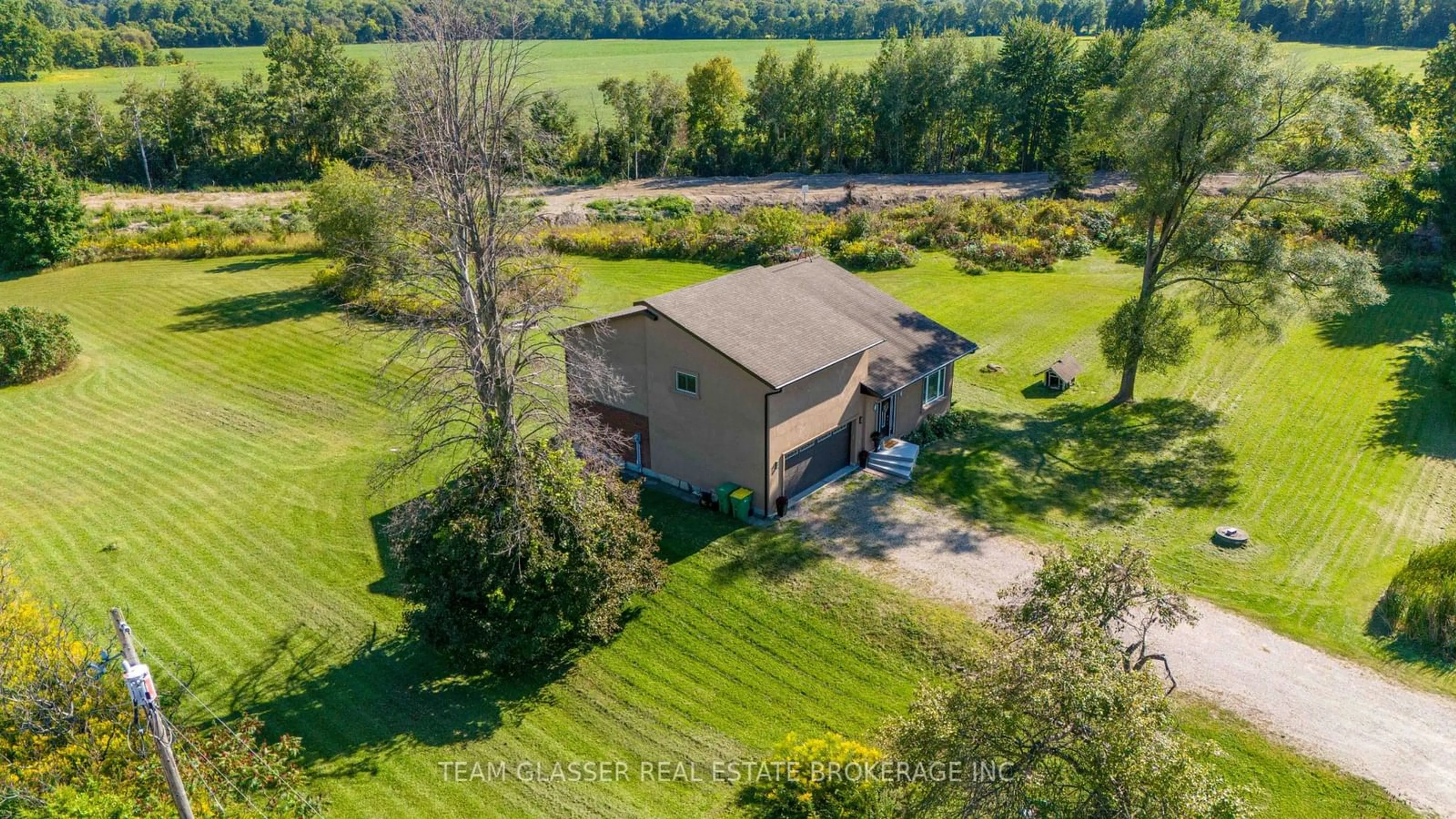 Frontside or backside of a home, the fenced backyard for 6571 CARROLL Dr, Southwest Middlesex Ontario N0L 1T0