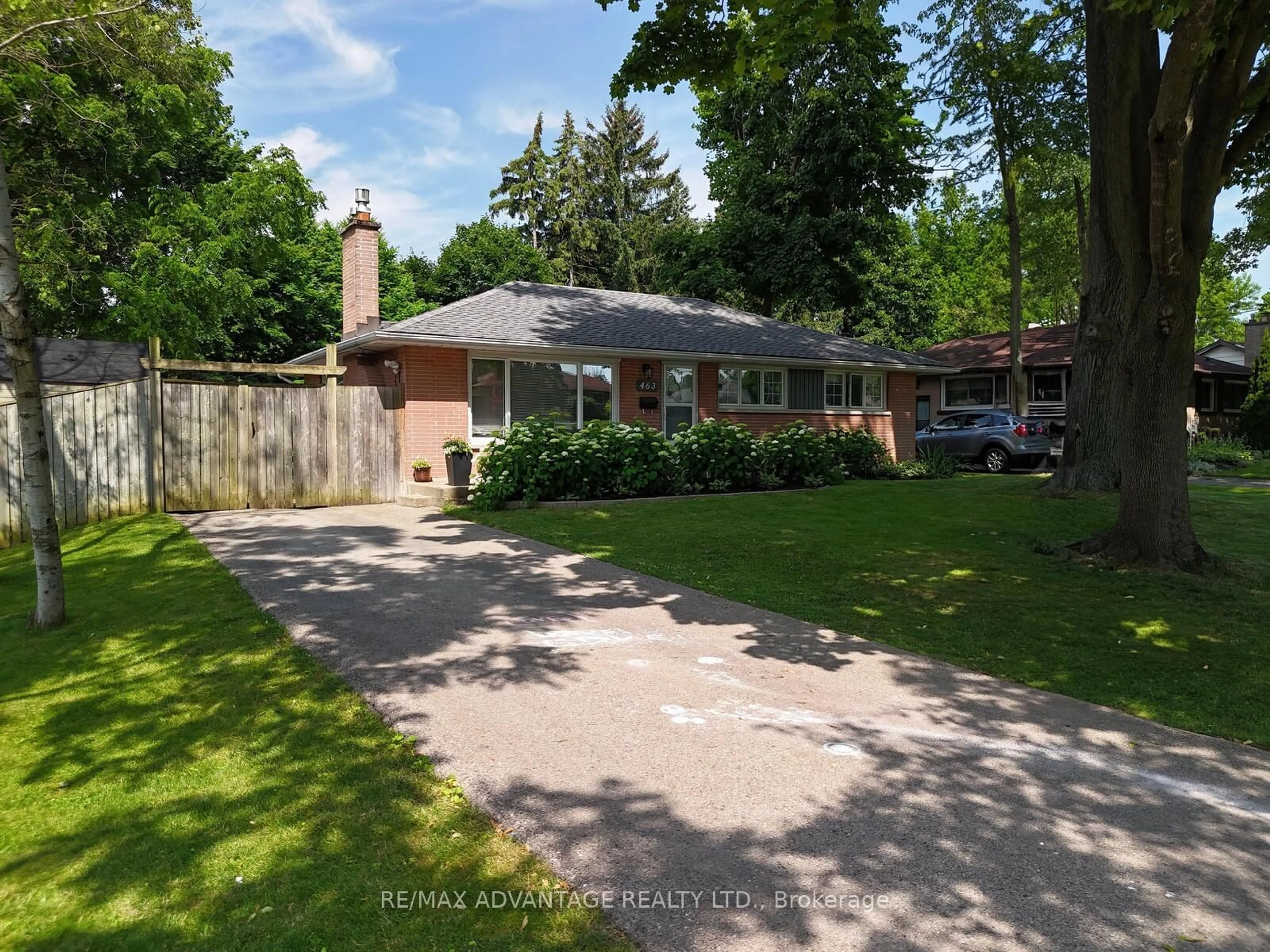 Frontside or backside of a home, the fenced backyard for 463 Jellicoe Cres, London Ontario N6K 2M6