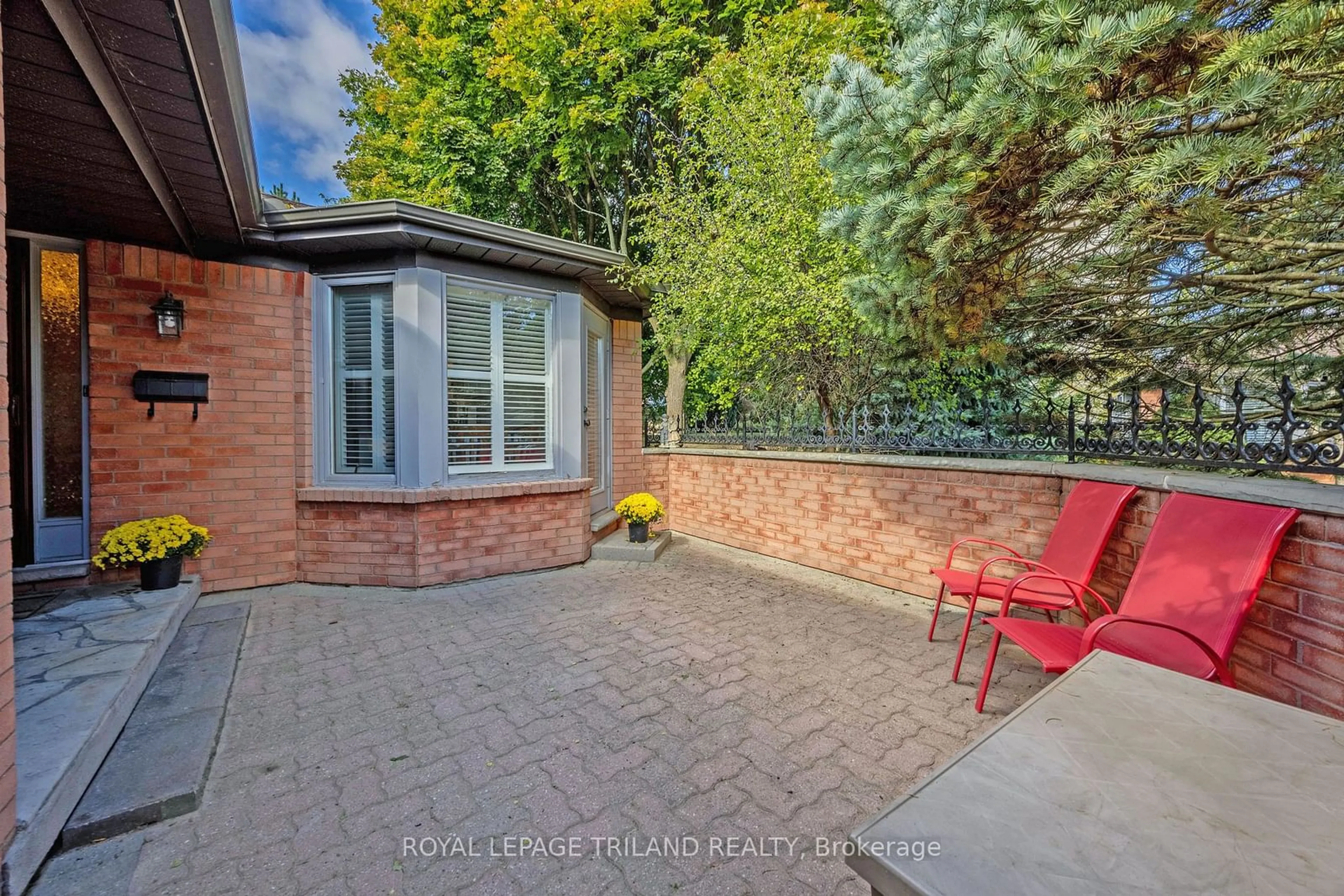 Patio, the fenced backyard for 65 Fiddlers Green Rd #19, London Ontario N6H 4V5