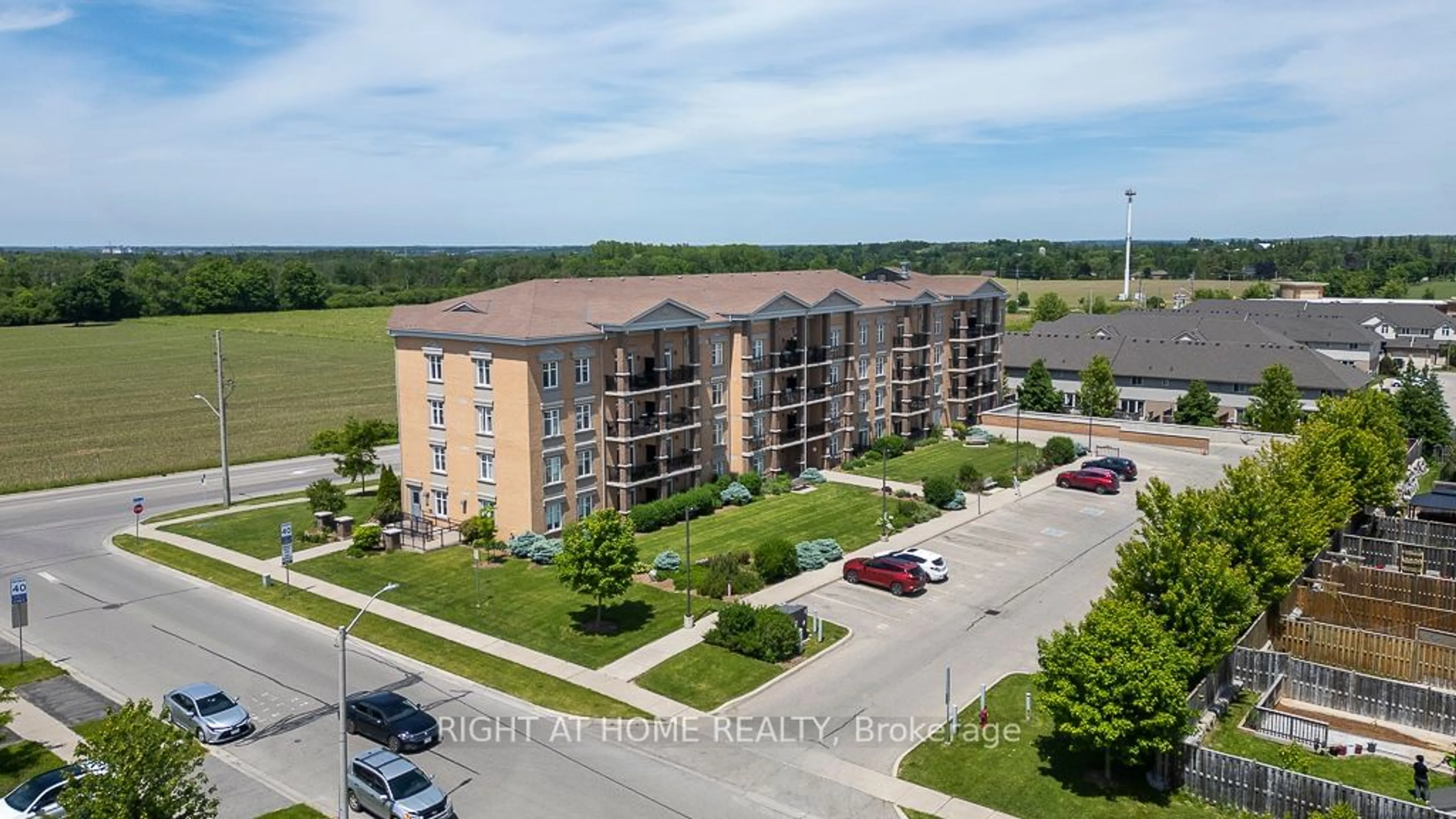 A pic from exterior of the house or condo, the front or back of building for 2 Colonial Dr #412, Guelph Ontario N1L 0K8