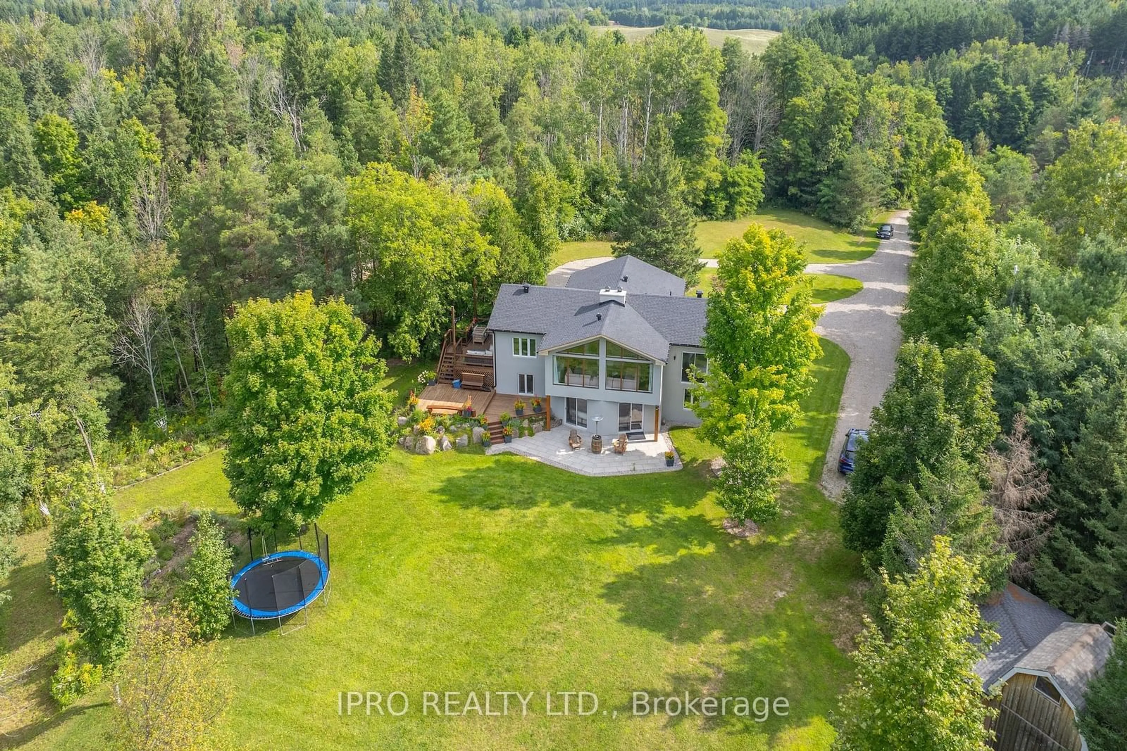 Frontside or backside of a home, the fenced backyard for 993608 Mono-Adjala Townline, Mono Ontario L9W 6H4