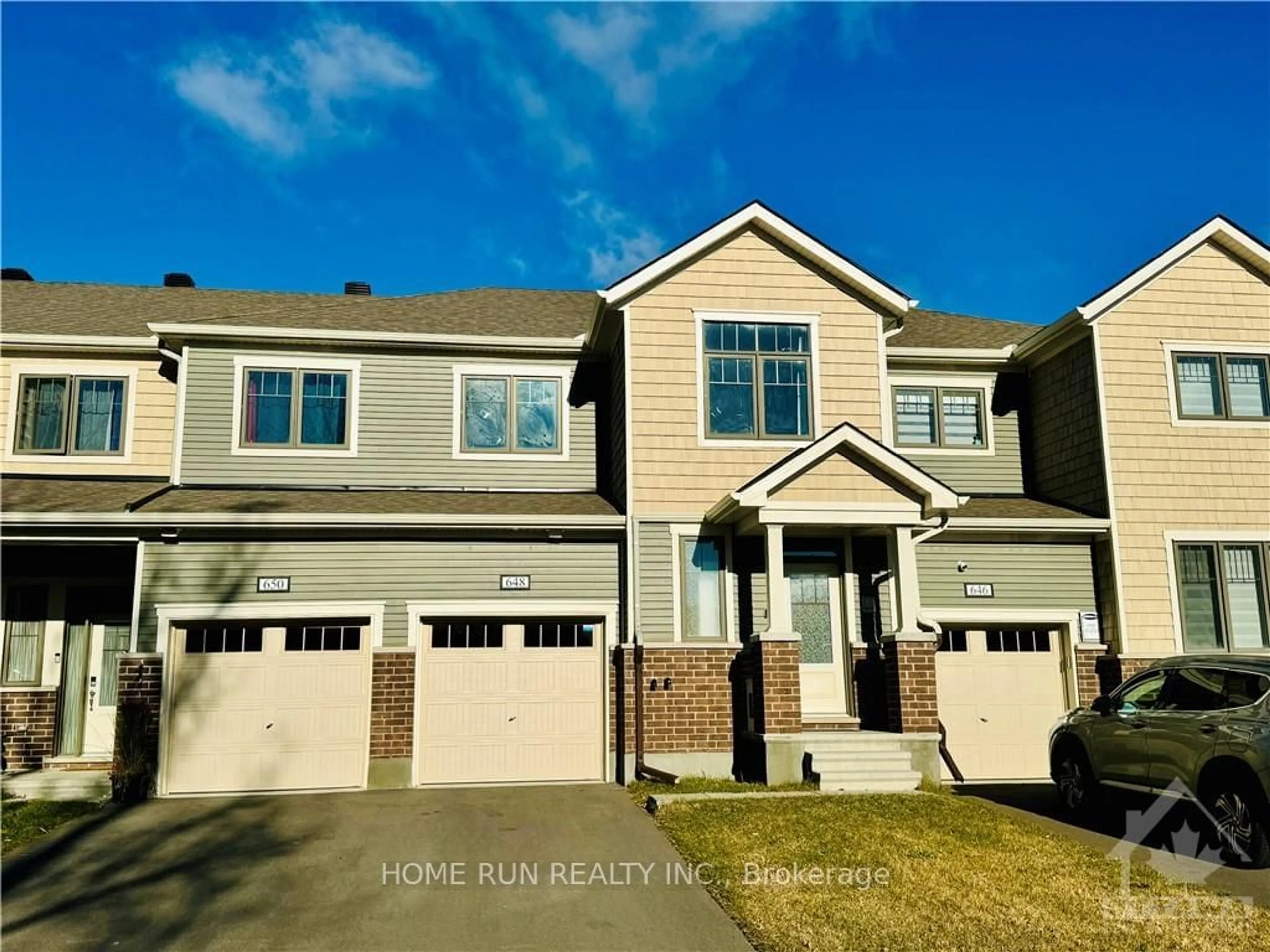 Frontside or backside of a home, the street view for 648 CYGNUS St, Barrhaven Ontario K2J 7B2