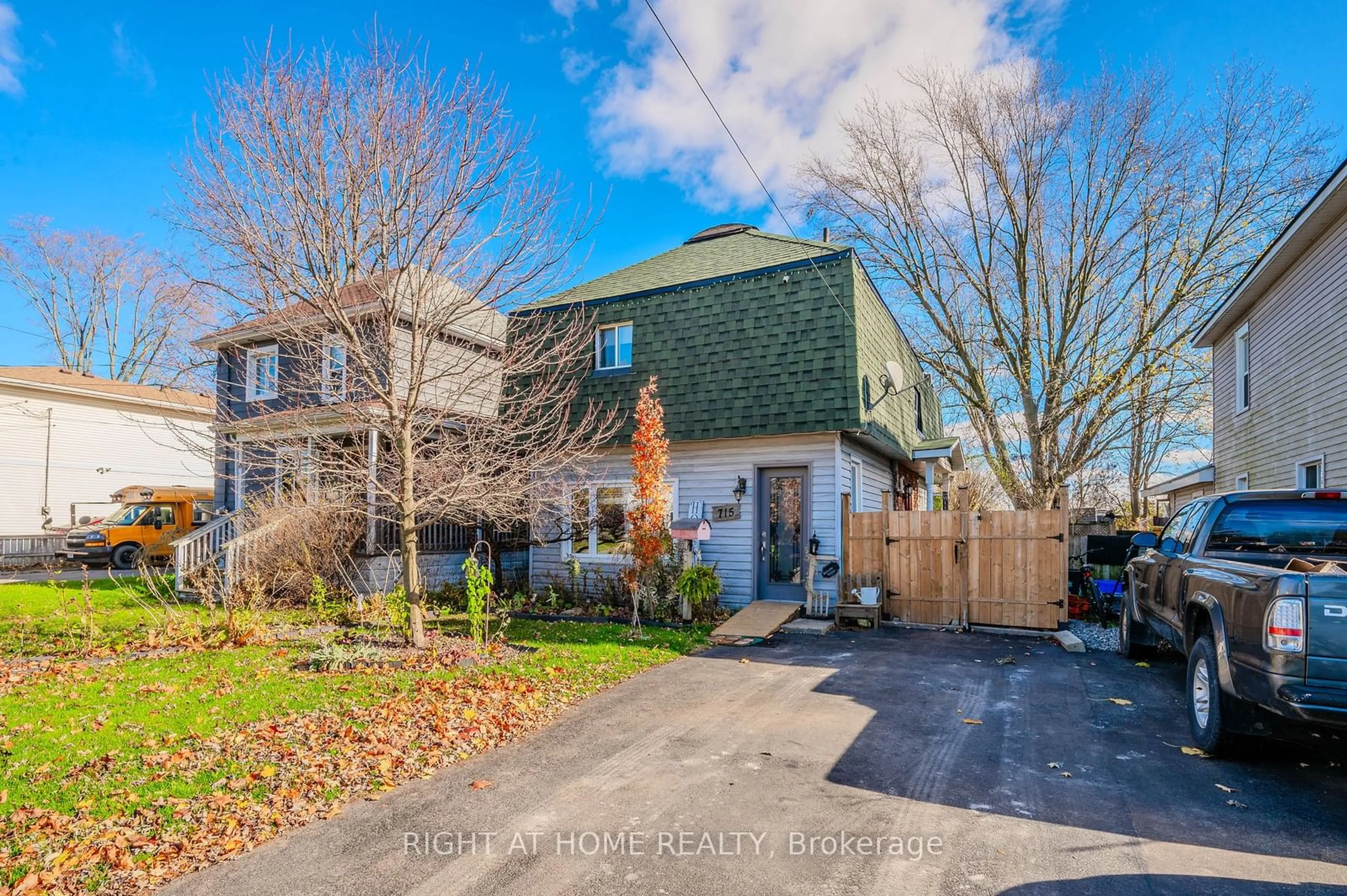 A pic from exterior of the house or condo, the fenced backyard for 715 Tamarac St, Haldimand Ontario N1A 2E3