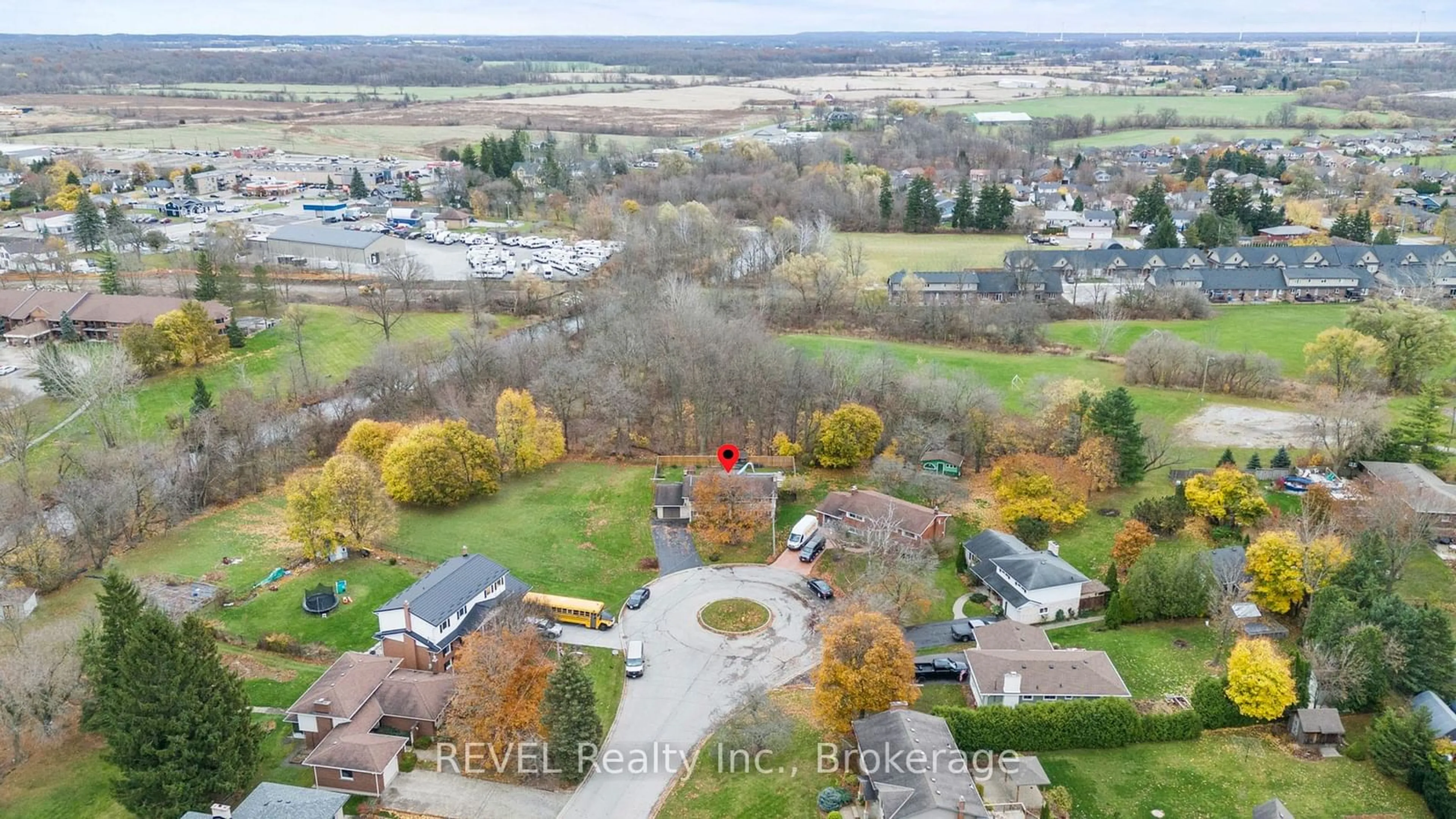 A pic from exterior of the house or condo, the fenced backyard for 33 Ellis St, West Lincoln Ontario L0R 2A0