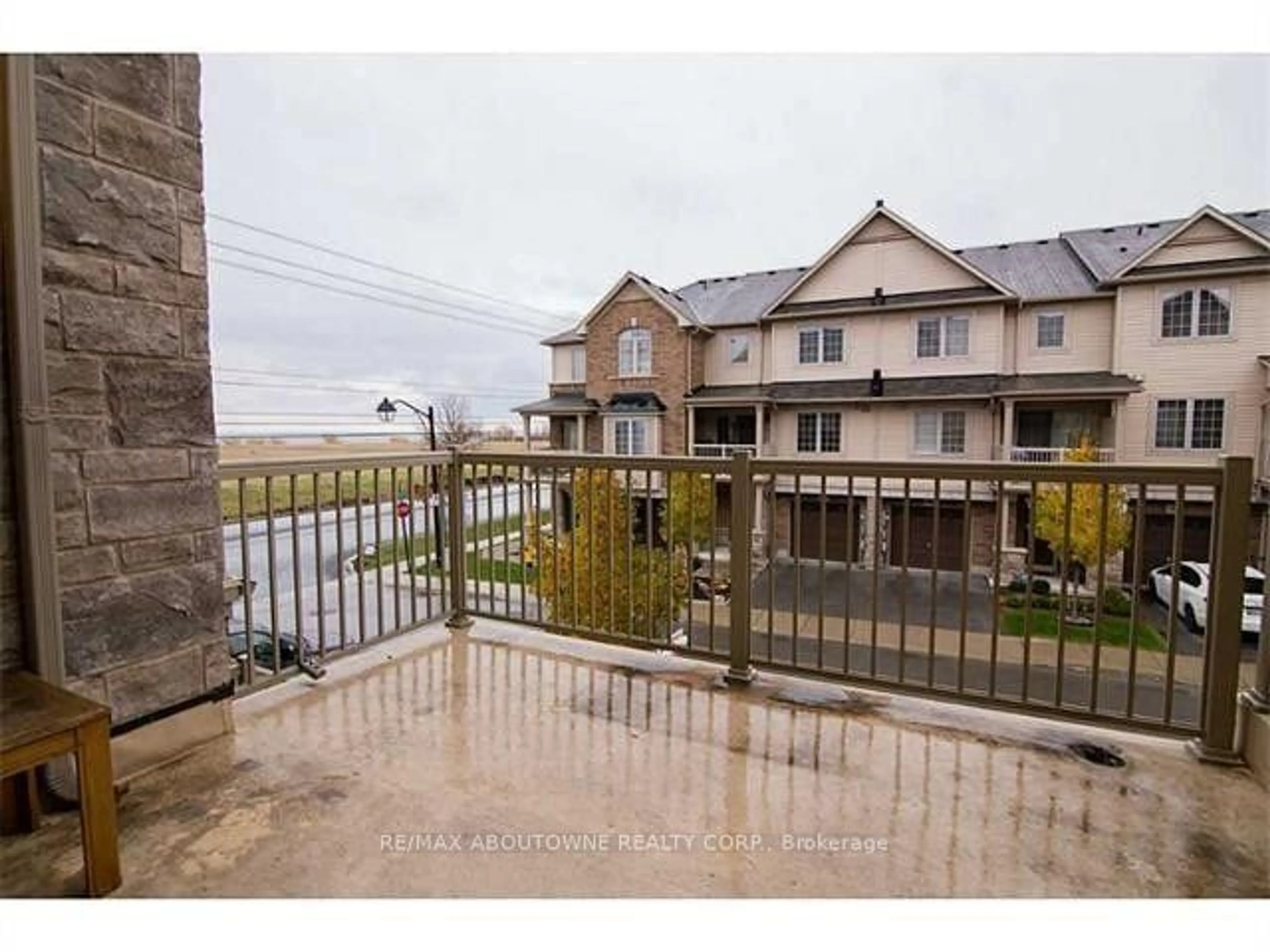 A pic from exterior of the house or condo, the fenced backyard for 541 Winston Rd #63, Grimsby Ontario L3M 0C5