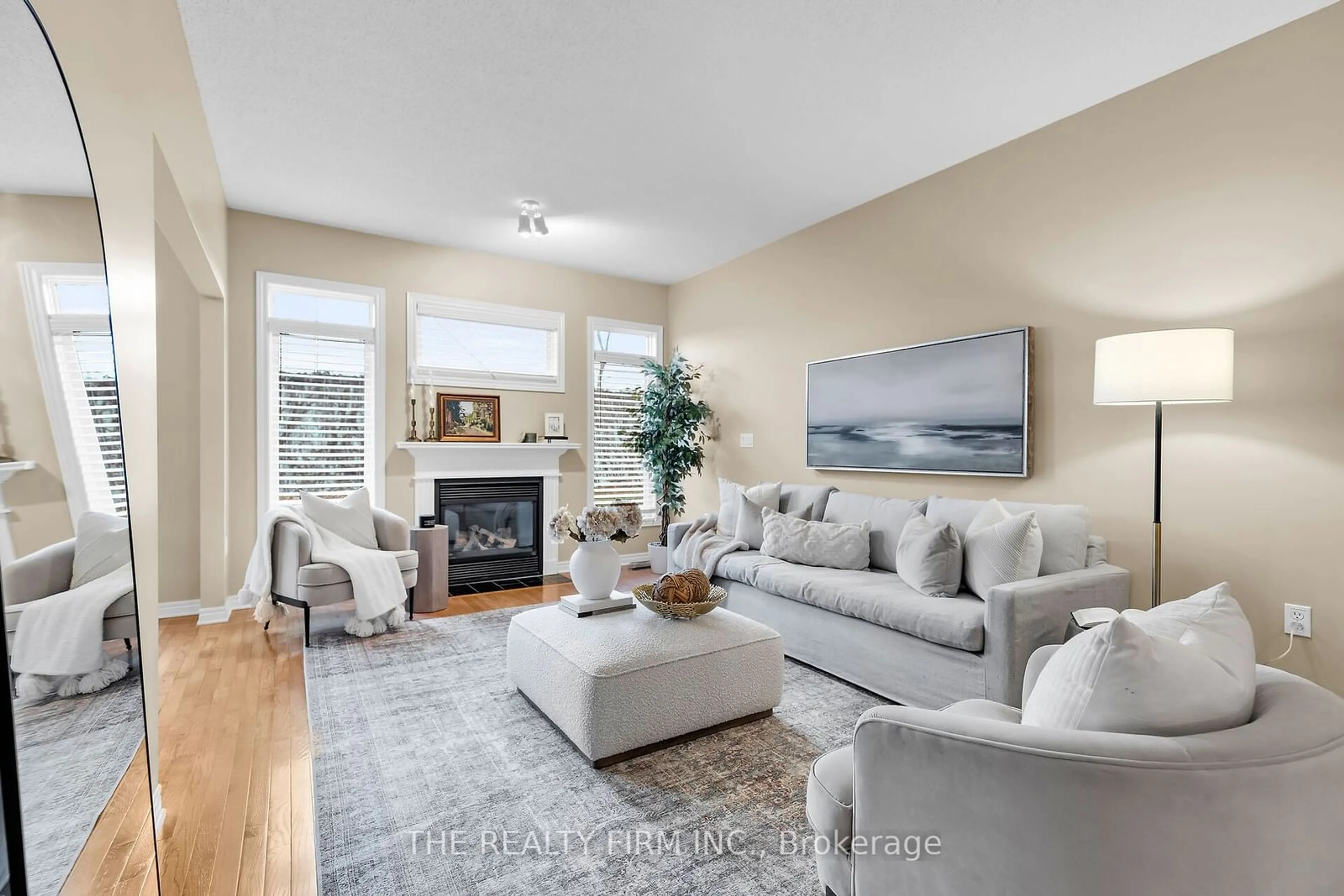 Living room, wood floors for 2025 Meadowgate Blvd #257, London Ontario N6M 1K9